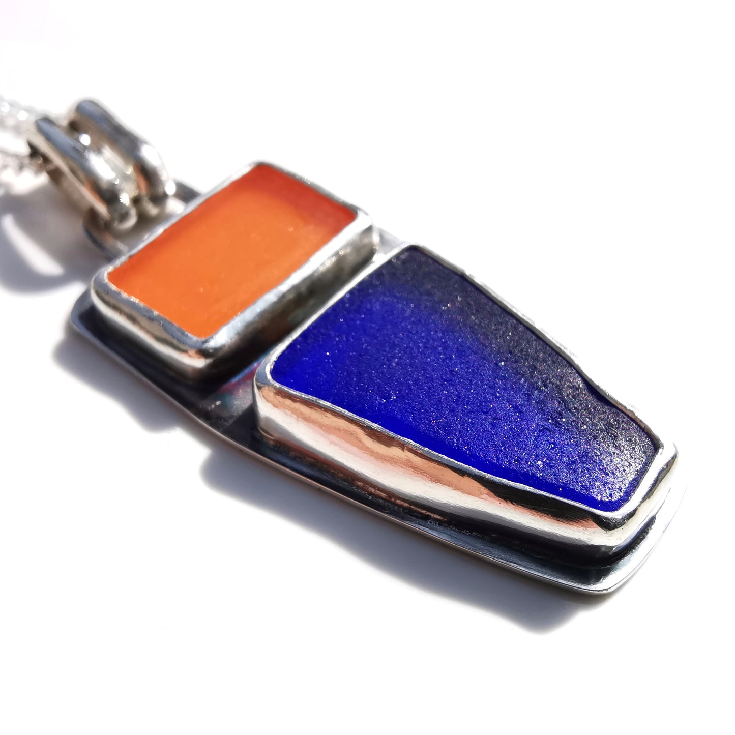 Scottish orange and blue sea glass & sterling silver pendant.