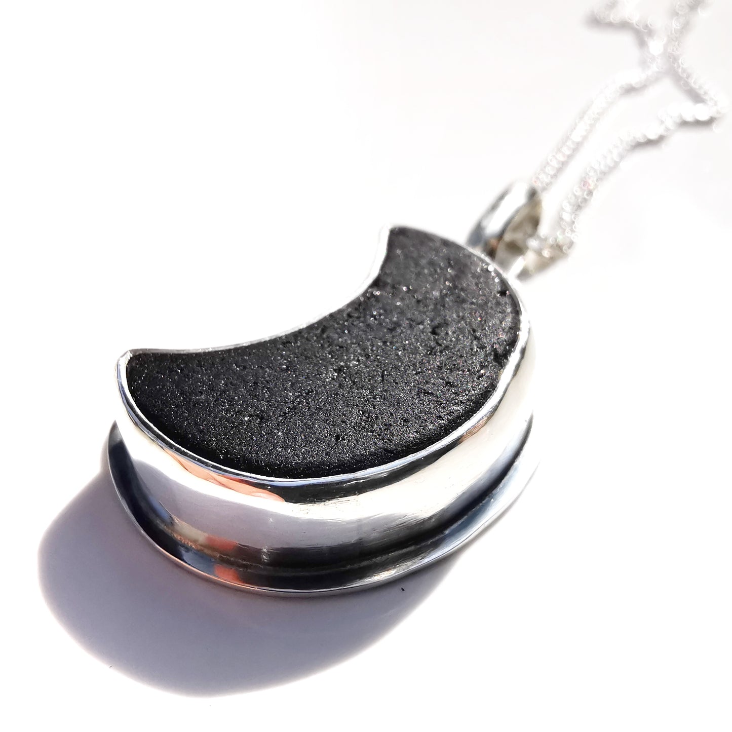 Scottish black crescent moon sea glass & sterling silver pendant.