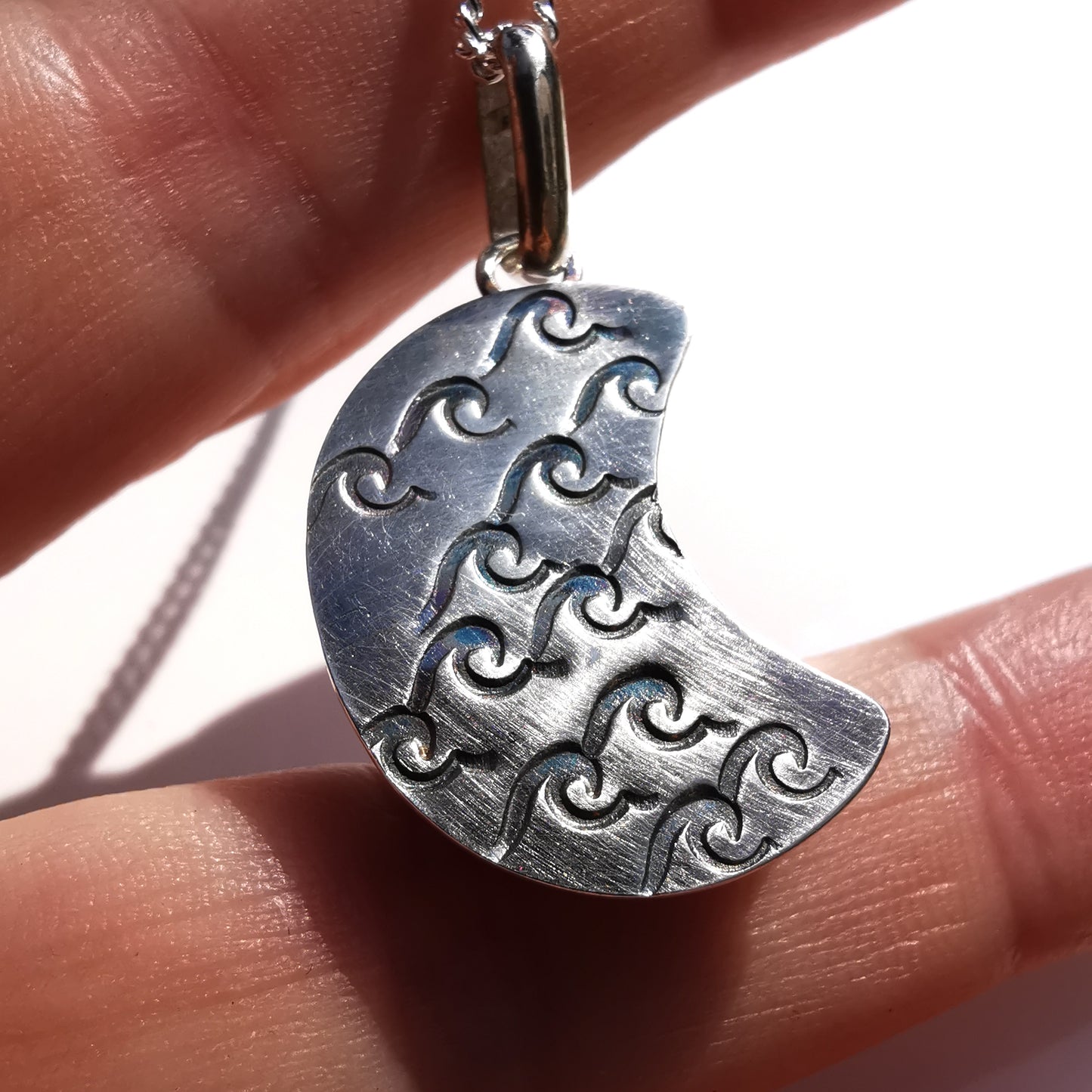 Scottish black crescent moon sea glass & sterling silver pendant.