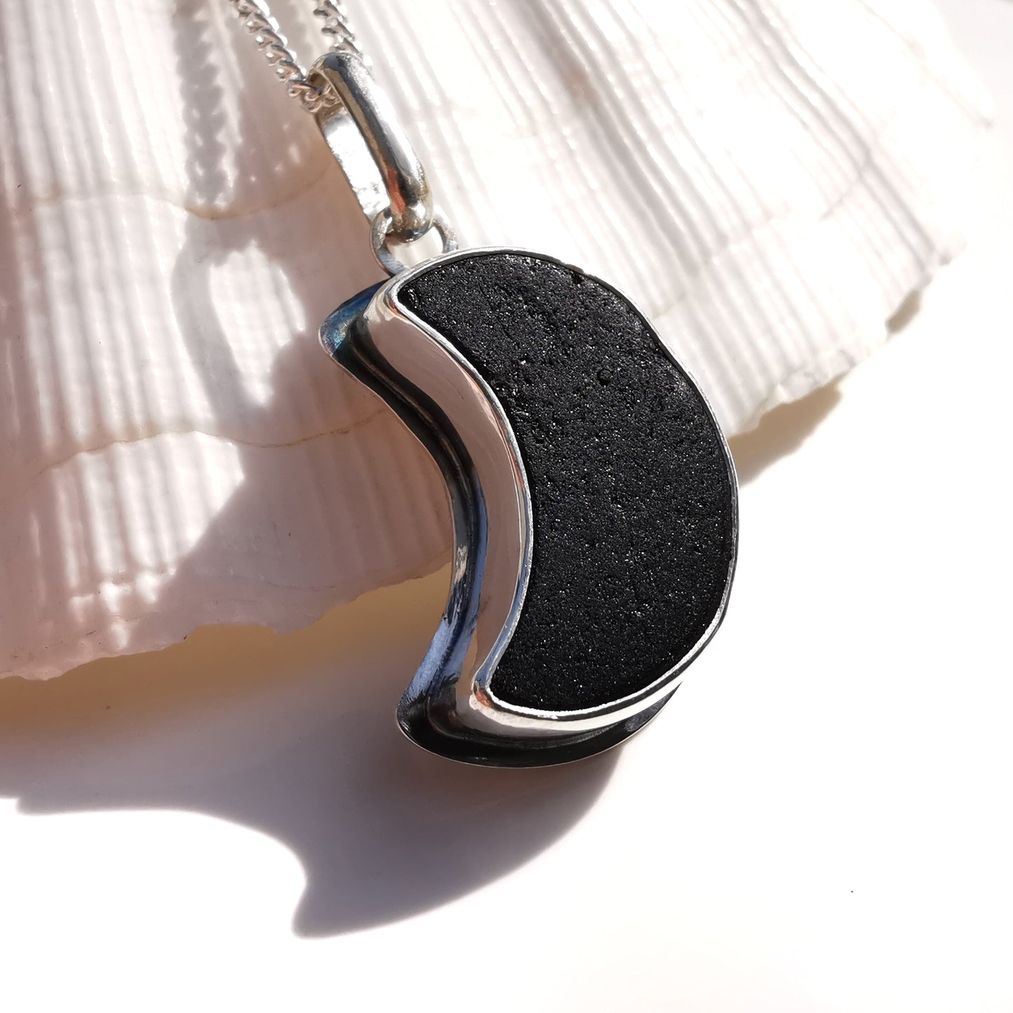 Scottish black crescent moon sea glass & sterling silver pendant.