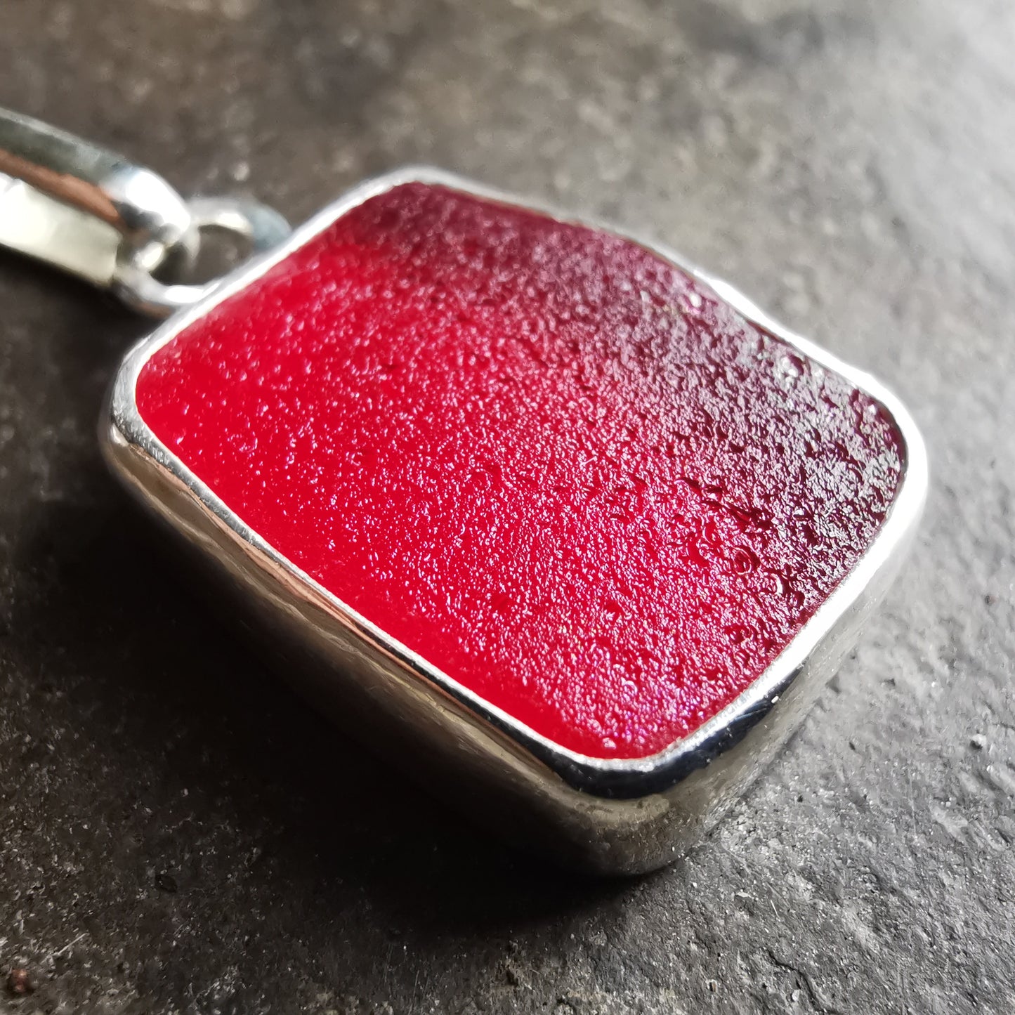Scottish red UV sea glass & sterling silver pendant.