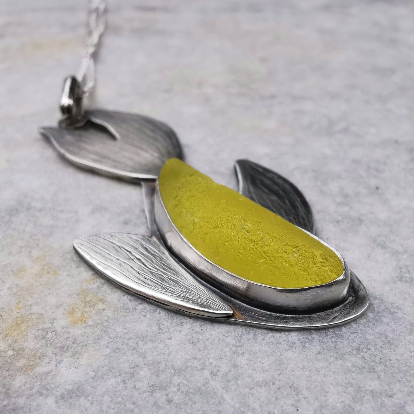 Reserved for Gatia. Scottish fish UV bright yellow sea glass & sterling silver pendant.