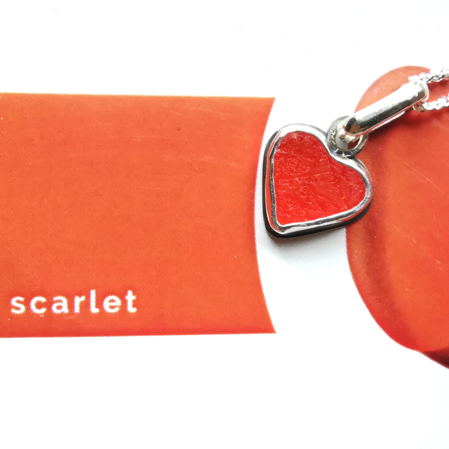 Reserved for Gatia. Scottish orange sea glass heart & sterling silver pendant.