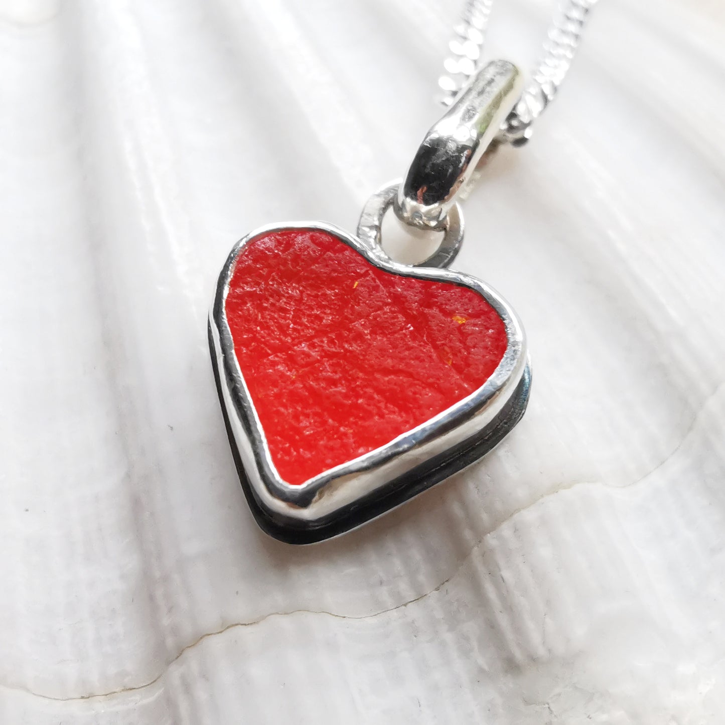 Reserved for Gatia. Scottish orange sea glass heart & sterling silver pendant.