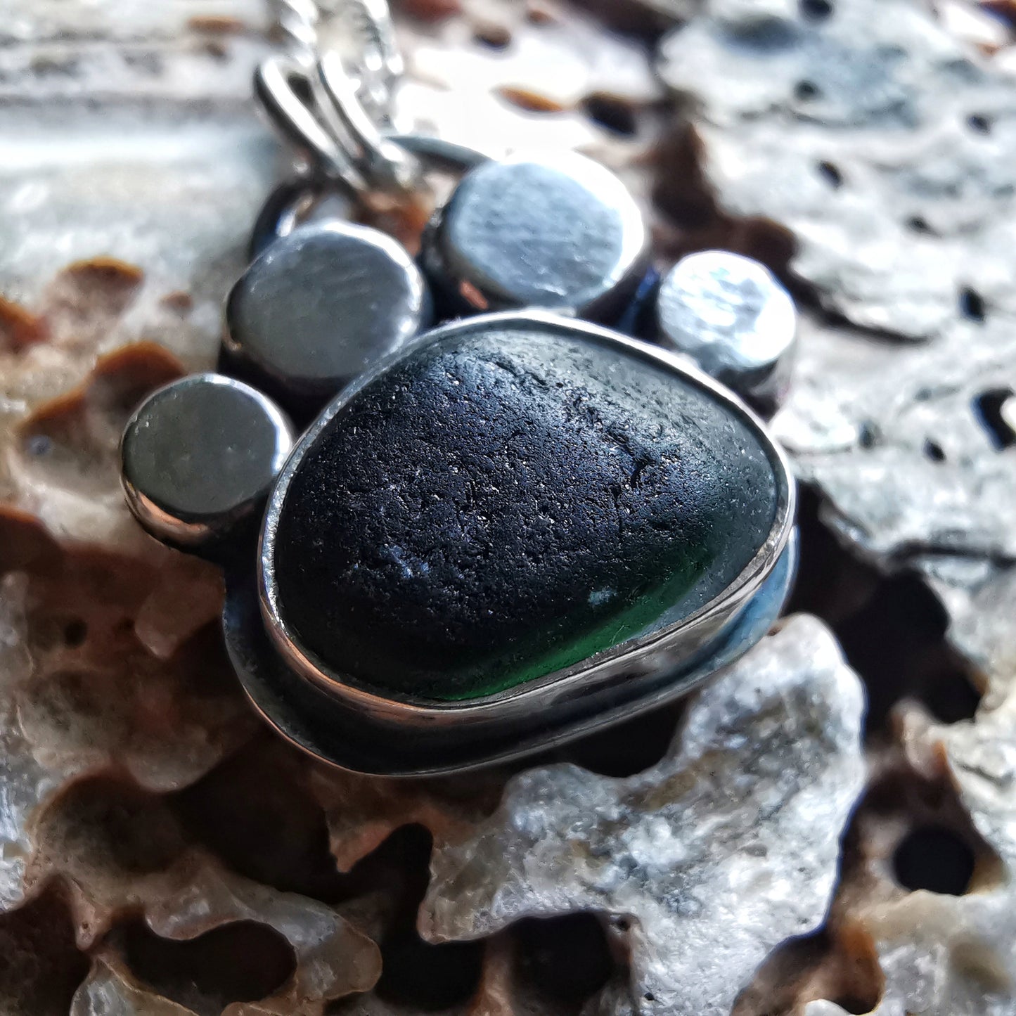 Seaham green and clear multi sea glass & sterling silver paw pendant.