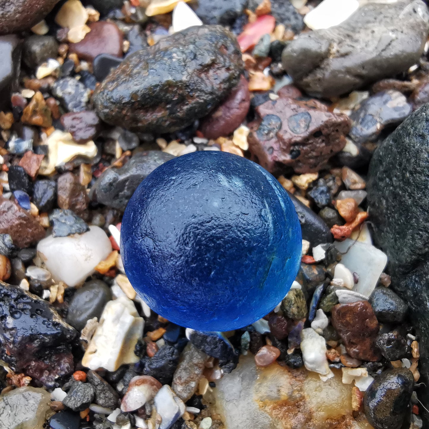 Scottish blue sea glass marble & sterling silver pendant.