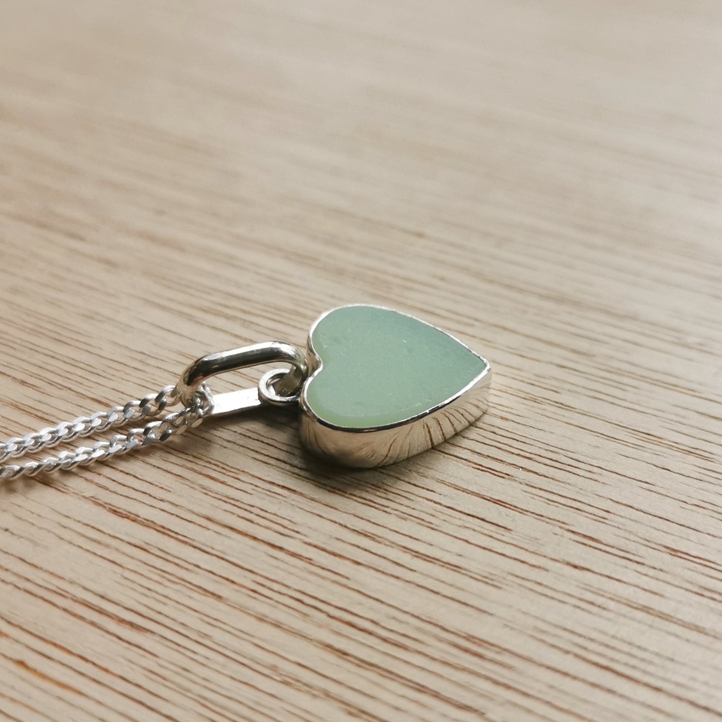 Reserved for Gatia. Scottish soft green sea glass heart & sterling silver pendant.