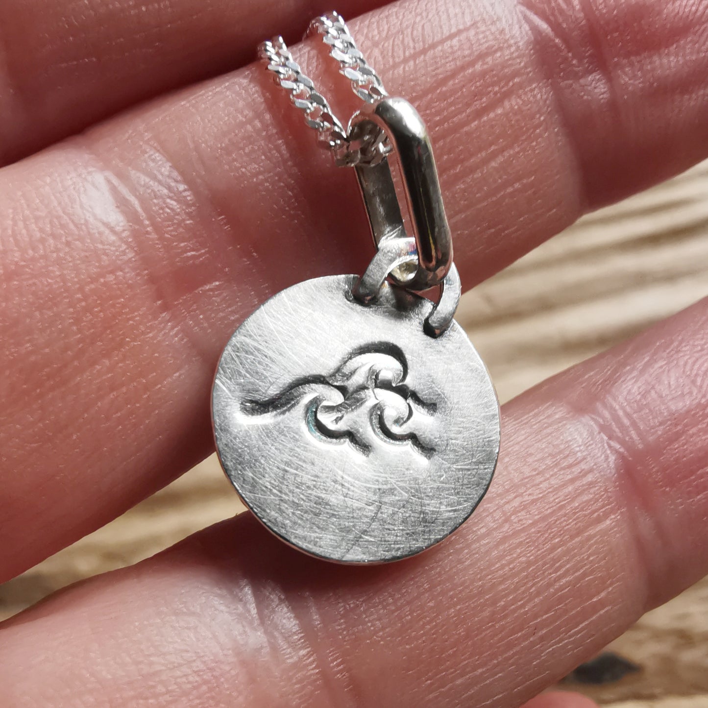 Tiny Scottish purple sea glass button & sterling silver pendant.