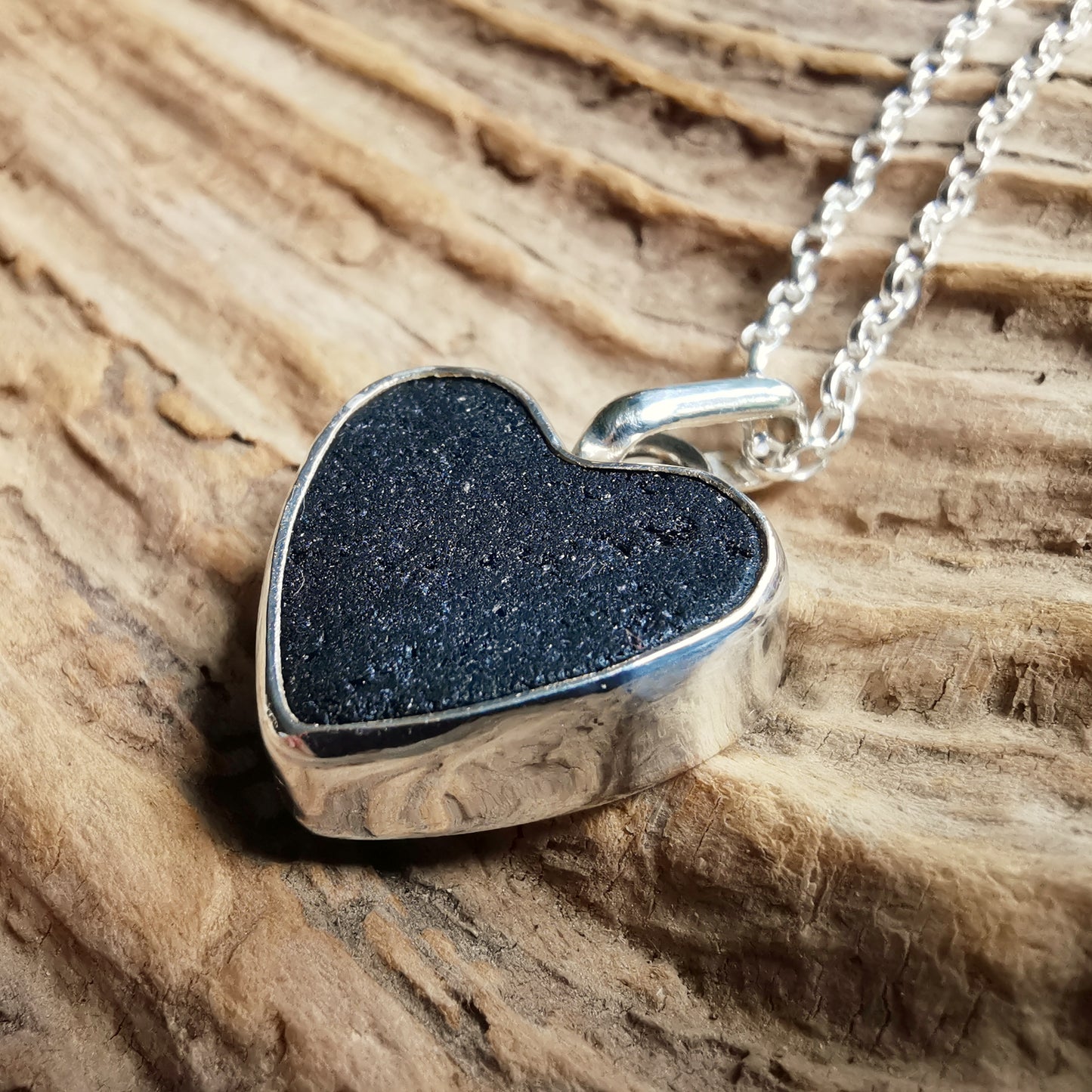 Reserved. Scottish black sea glass heart & sterling silver pendant.