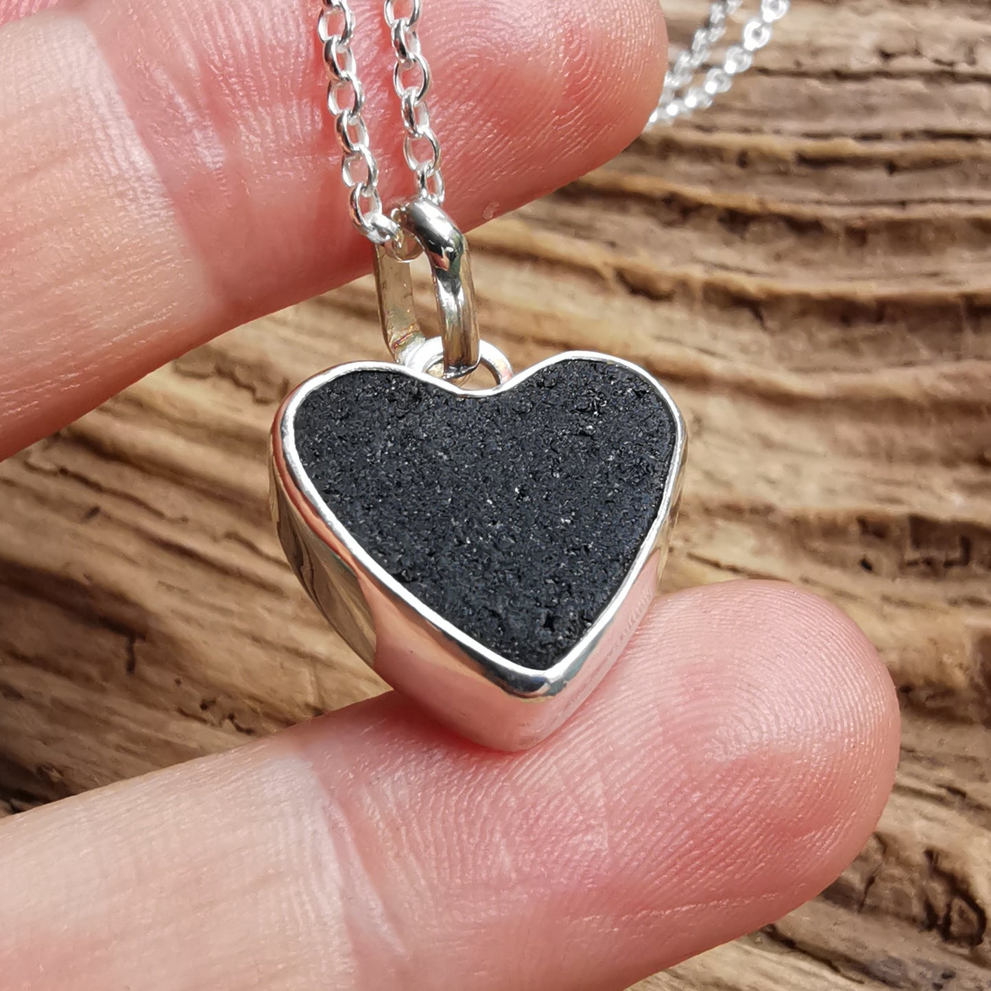 Reserved. Scottish black sea glass heart & sterling silver pendant.