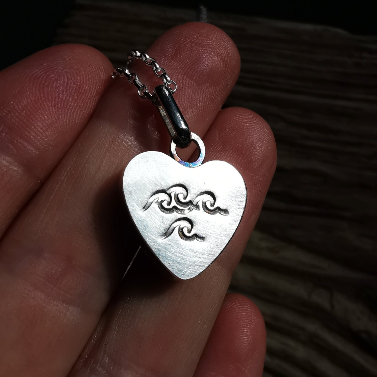 Reserved. Scottish black sea glass heart & sterling silver pendant.