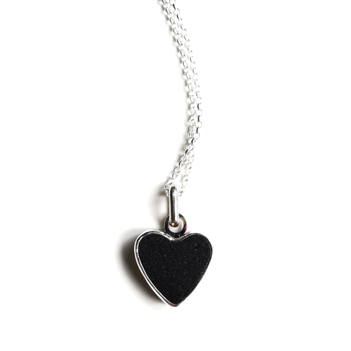 Reserved. Scottish black sea glass heart & sterling silver pendant.