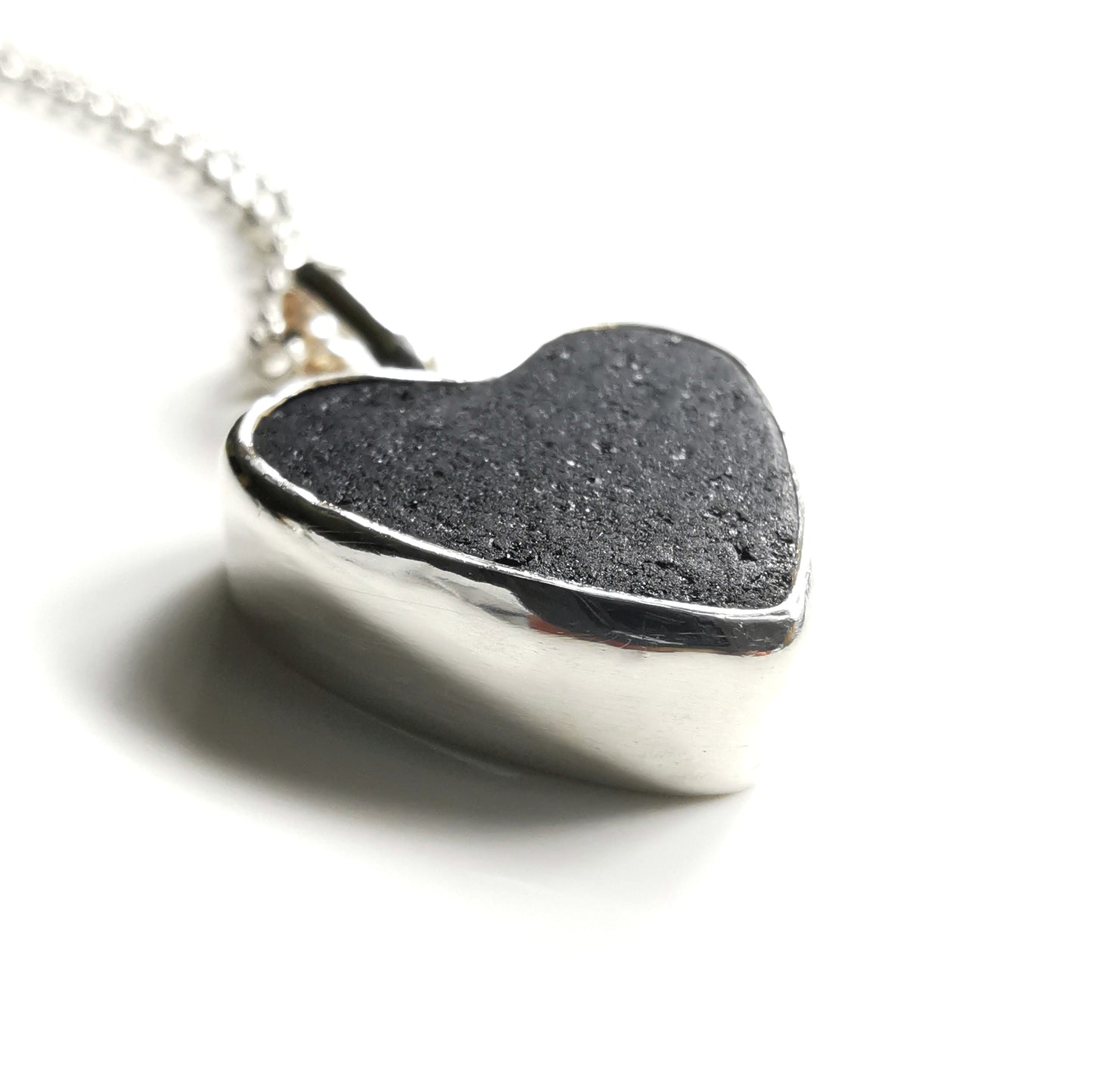 Reserved. Scottish black sea glass heart & sterling silver pendant.