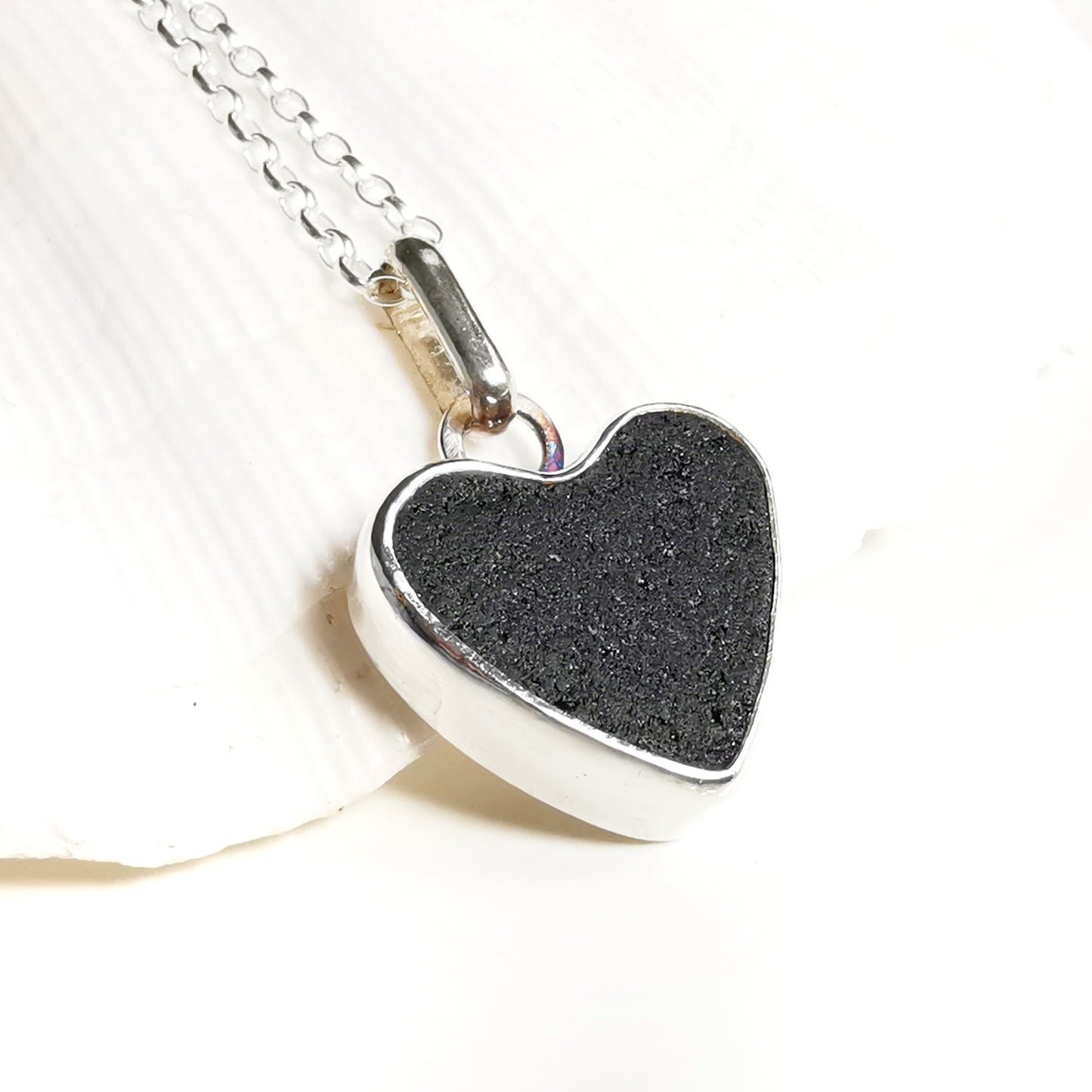 Reserved. Scottish black sea glass heart & sterling silver pendant.