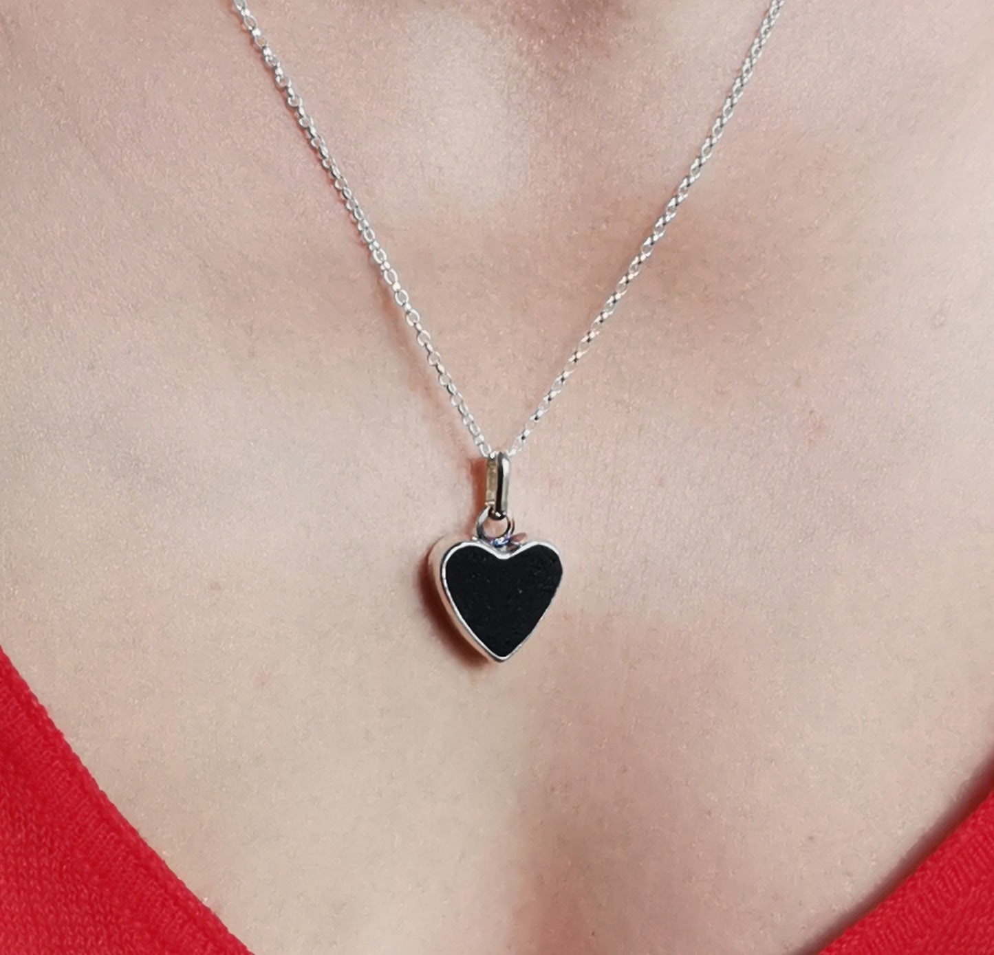 Reserved. Scottish black sea glass heart & sterling silver pendant.