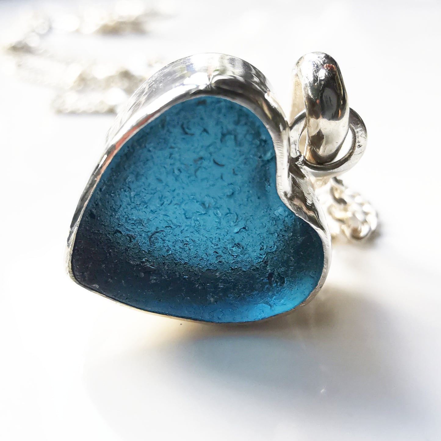 Scottish dark teal blue sea glass heart & sterling silver pendant.