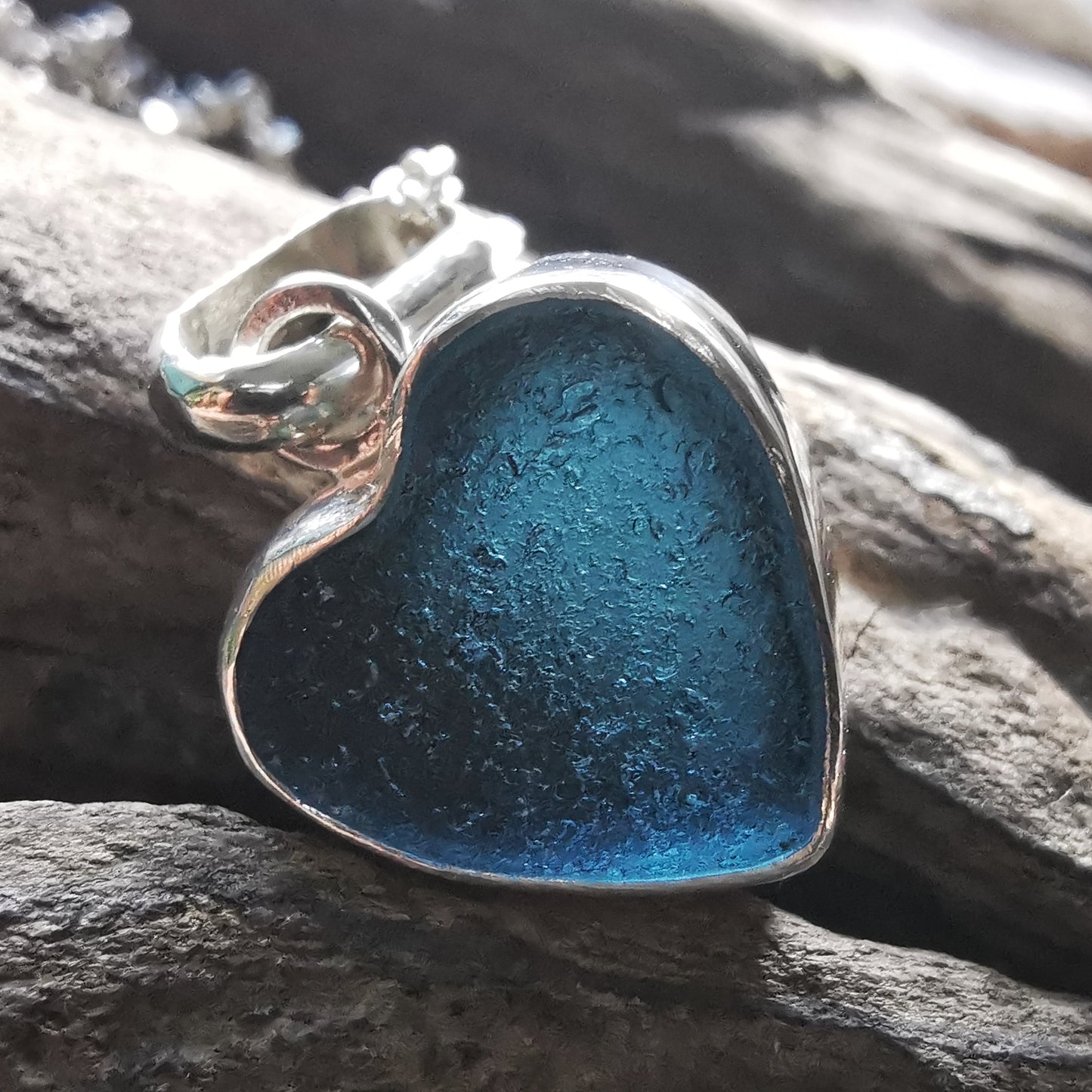 Scottish dark teal blue sea glass heart & sterling silver pendant.