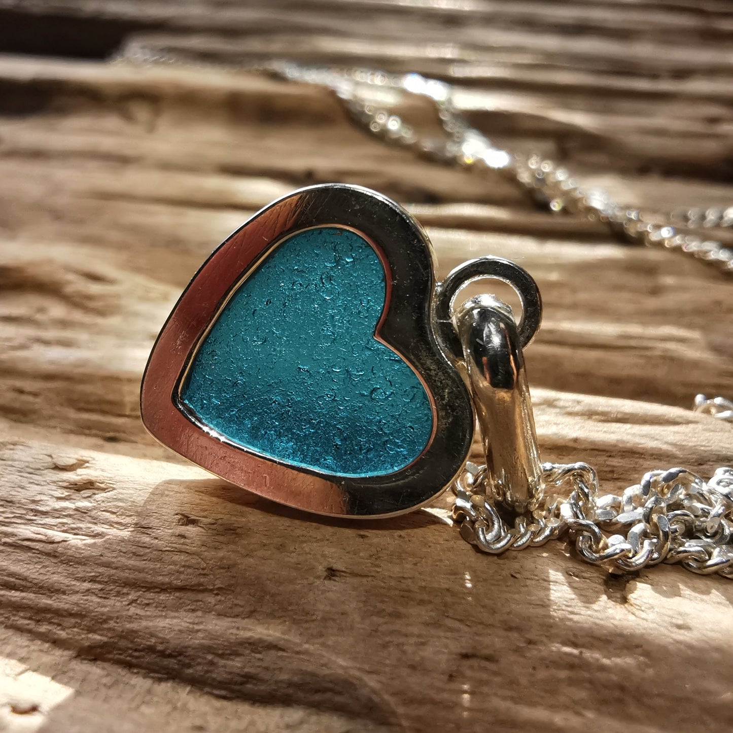 Scottish dark teal blue sea glass heart & sterling silver pendant.