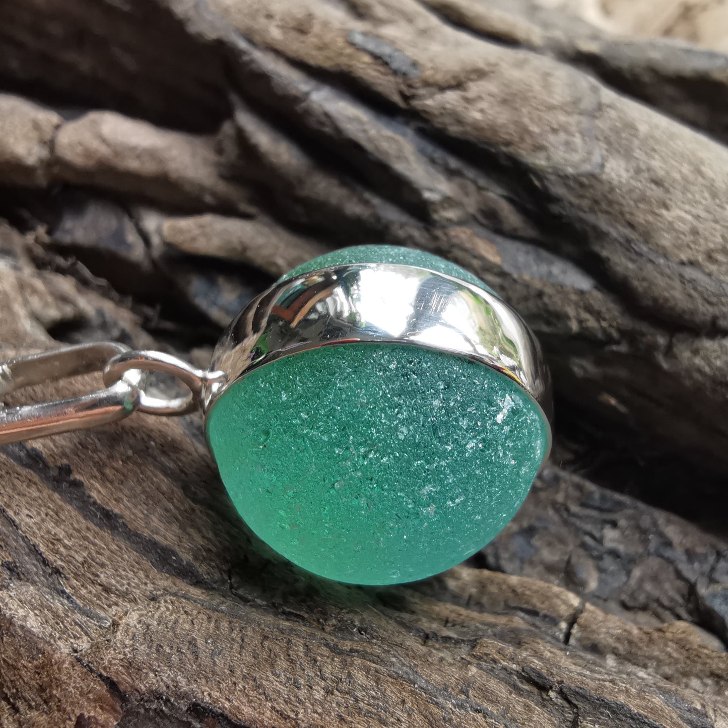 Scottish blue sea glass marble & sterling silver pendant.