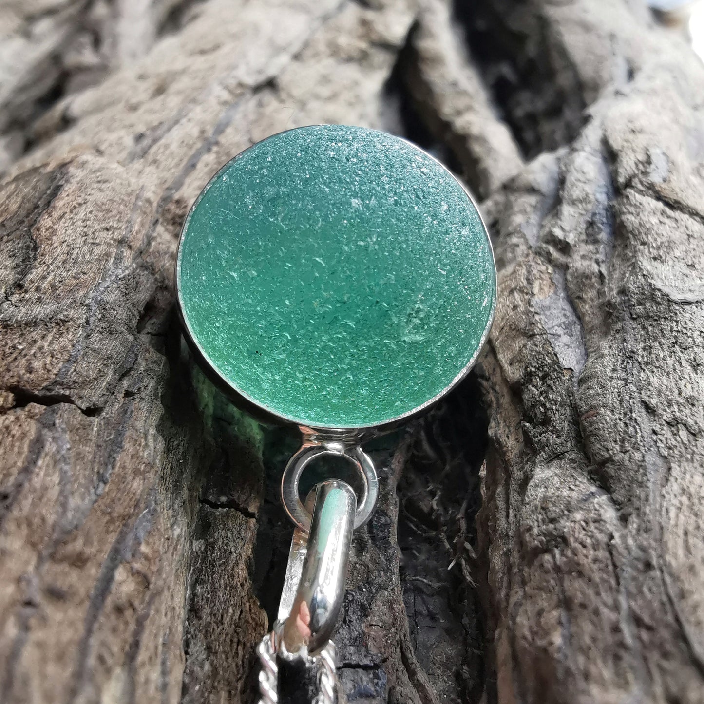 Scottish blue sea glass marble & sterling silver pendant.