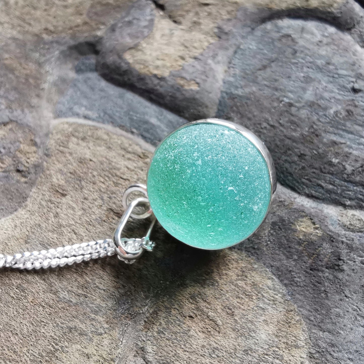 Scottish blue sea glass marble & sterling silver pendant.