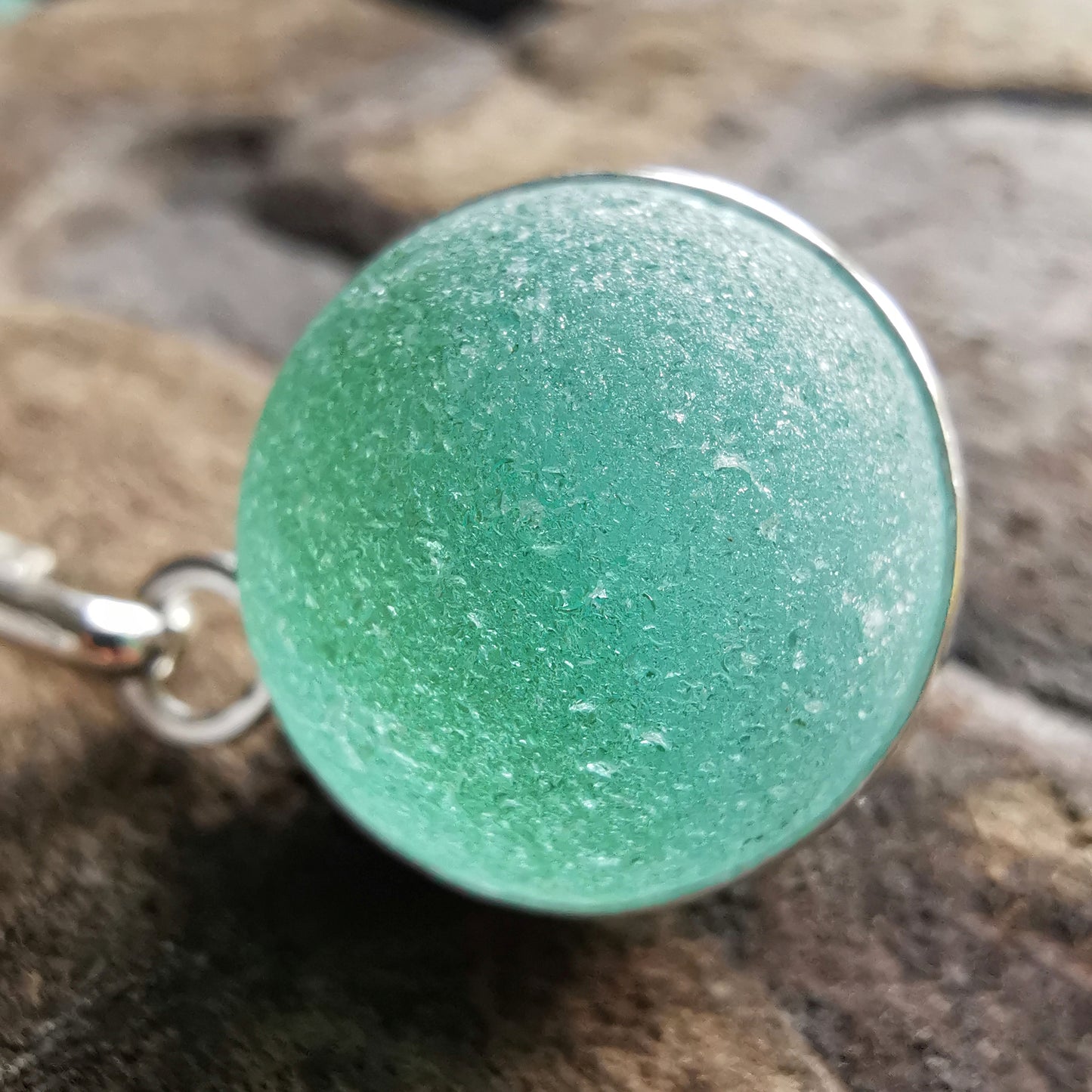 Scottish blue sea glass marble & sterling silver pendant.