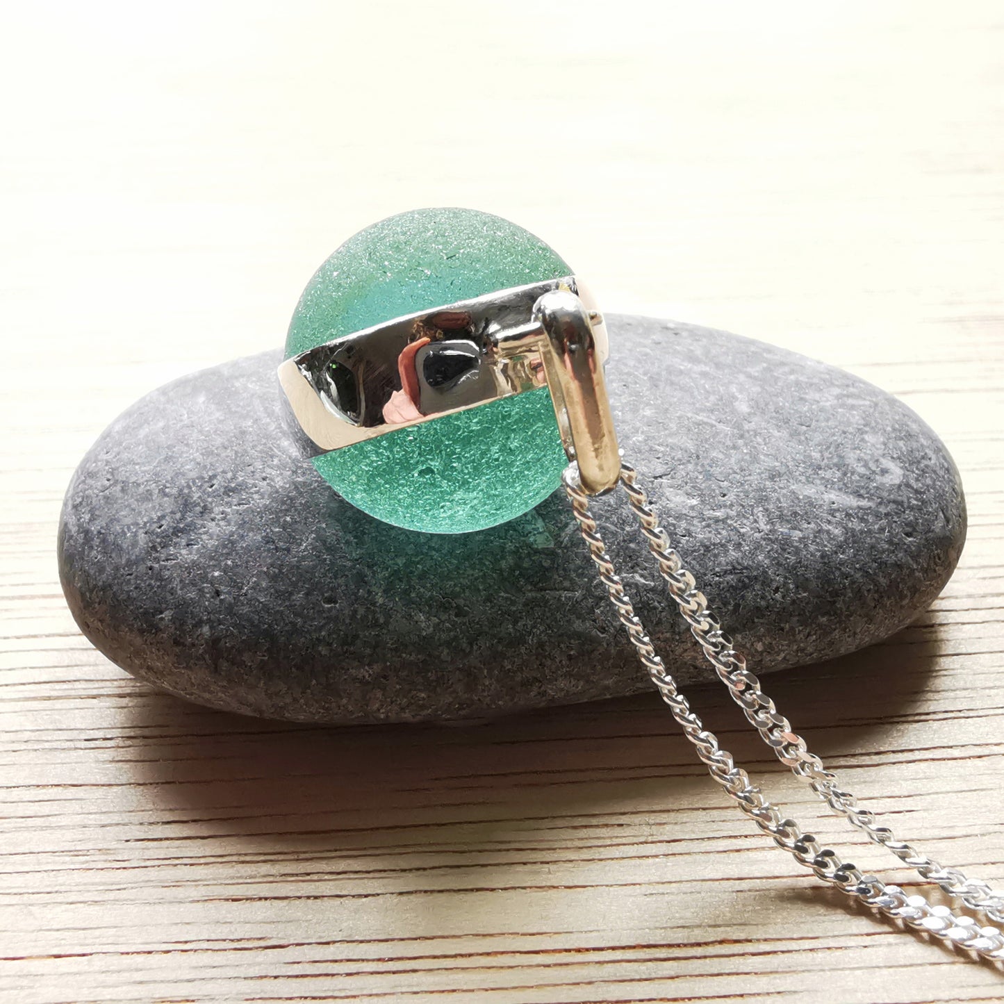 Scottish blue sea glass marble & sterling silver pendant.