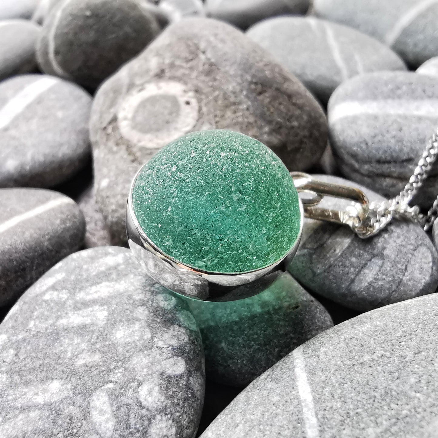 Scottish blue sea glass marble & sterling silver pendant.