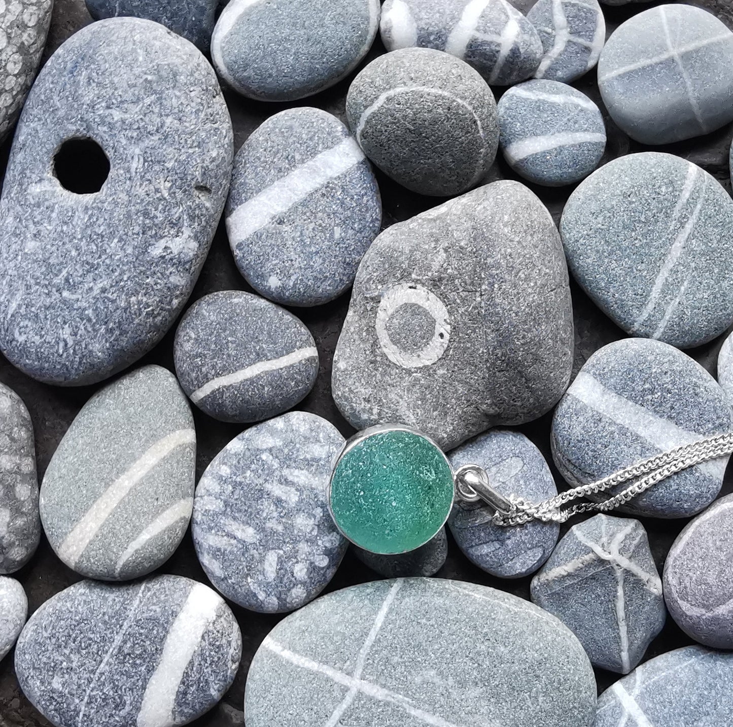 Scottish blue sea glass marble & sterling silver pendant.