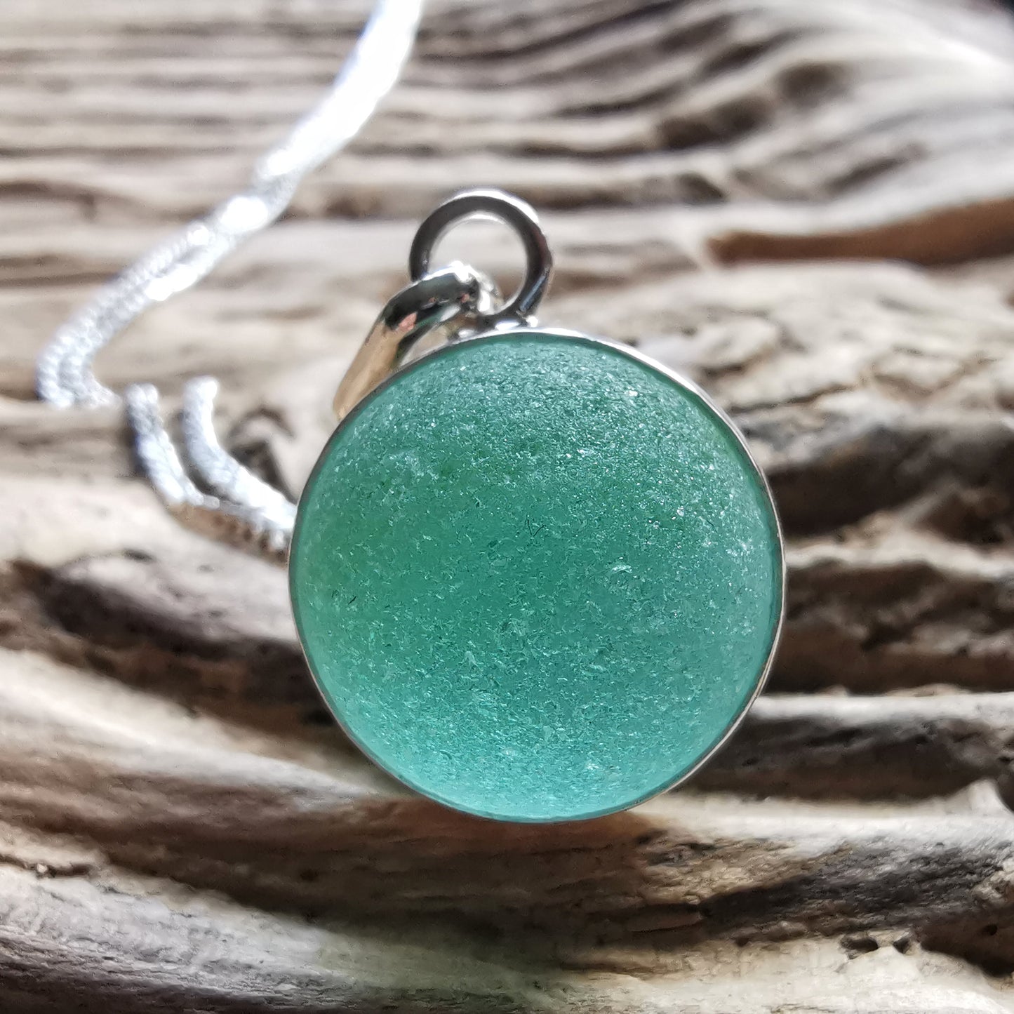 Scottish blue sea glass marble & sterling silver pendant.