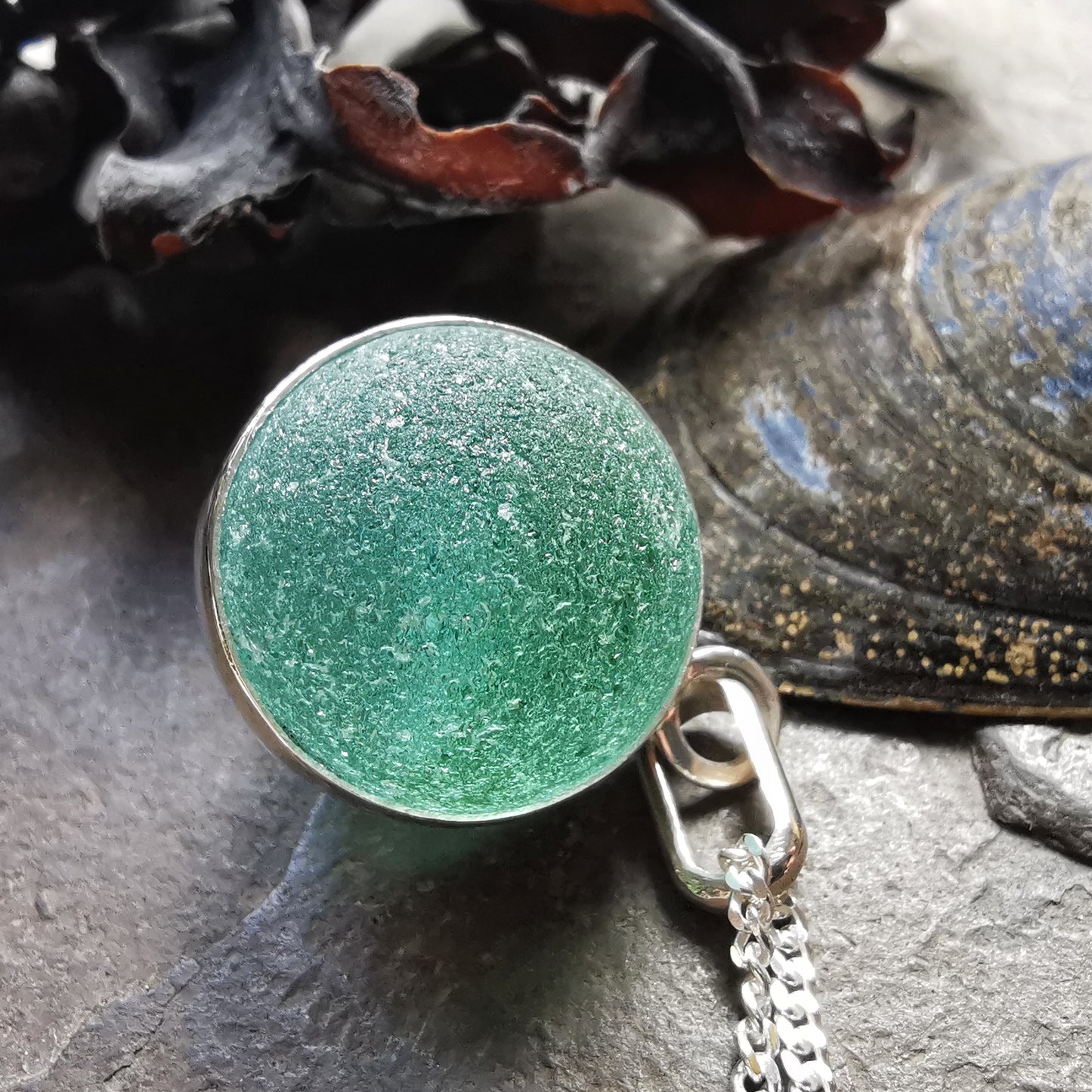 Scottish blue sea glass marble & sterling silver pendant.