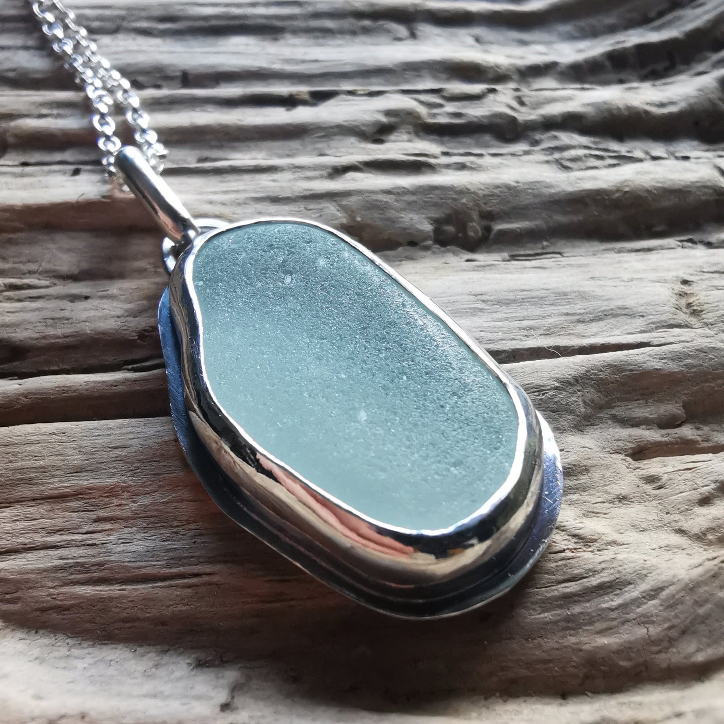 Custom made for Gillian. Seafoam sea glass & sterling silver pendant.