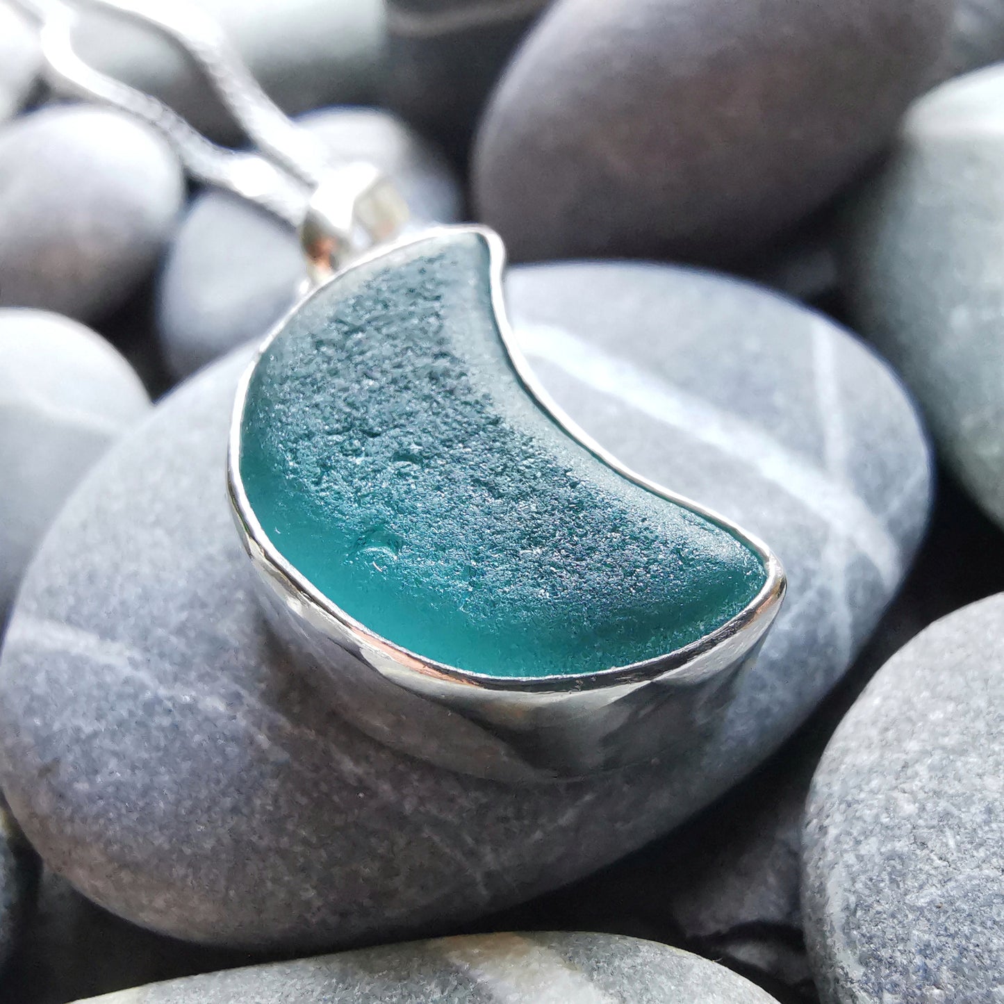 Scottish teal blue crescent moon sea glass & sterling silver pendant.