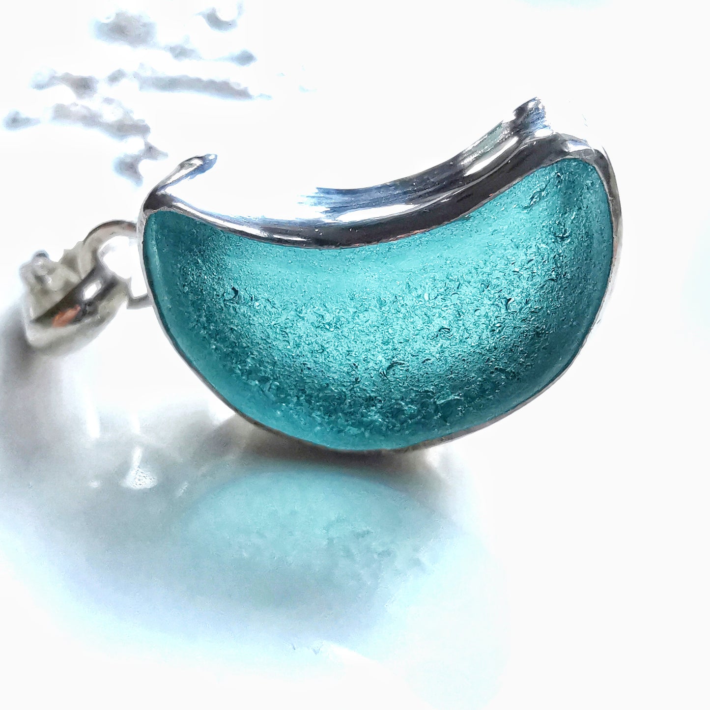 Scottish teal blue crescent moon sea glass & sterling silver pendant.
