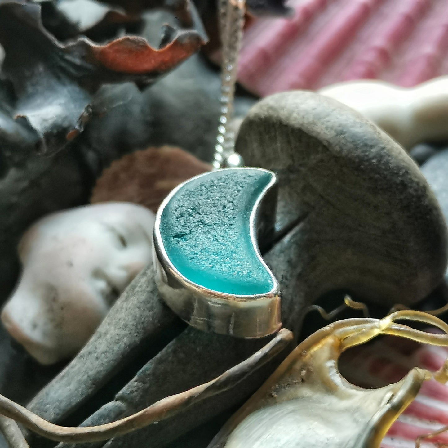 Scottish teal blue crescent moon sea glass & sterling silver pendant.