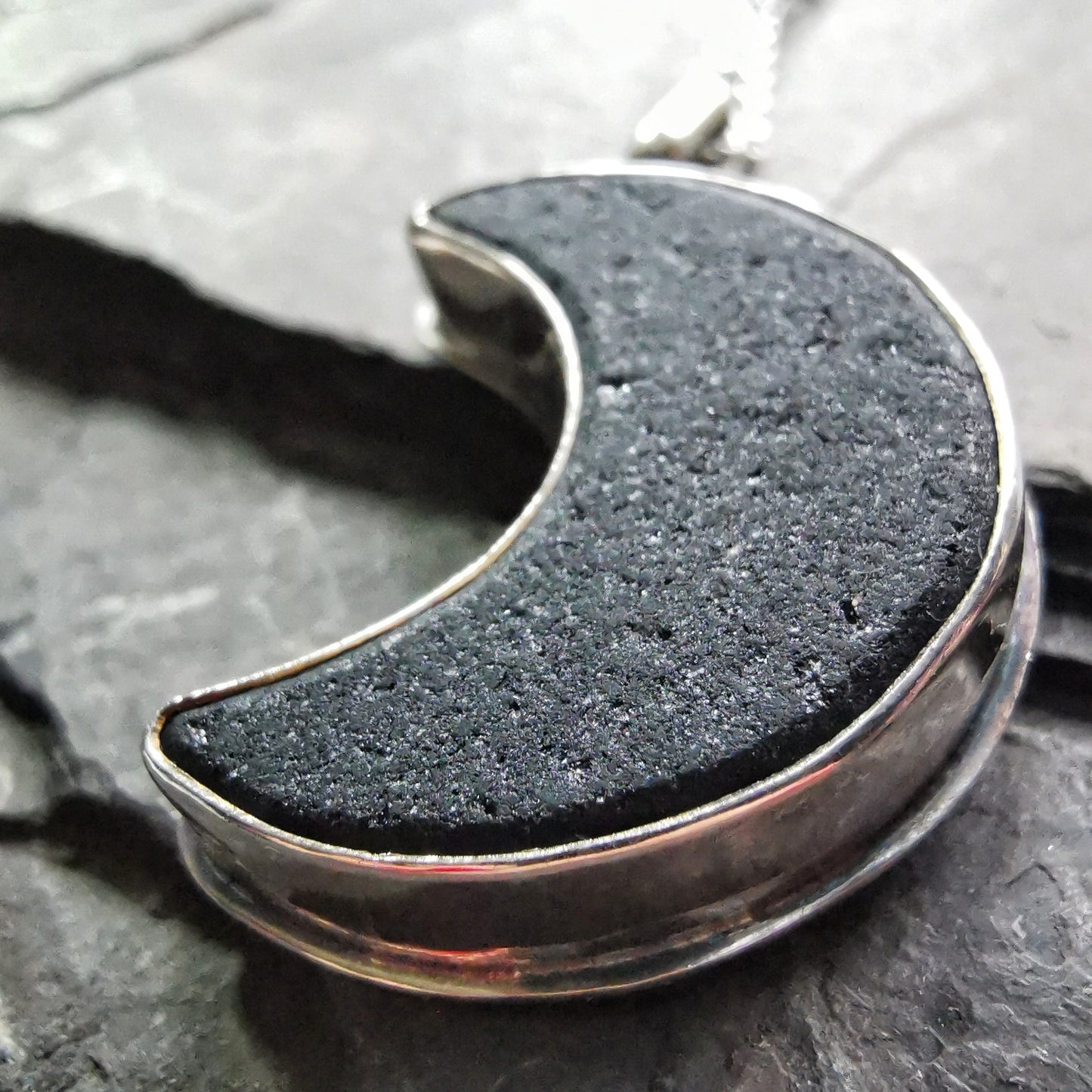 Scottish black crescent moon sea glass & sterling silver pendant.