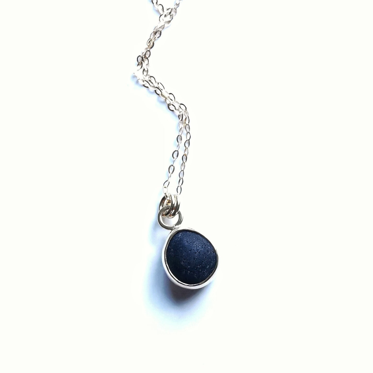 Genuine black sea glass & 9ct gold pendant.