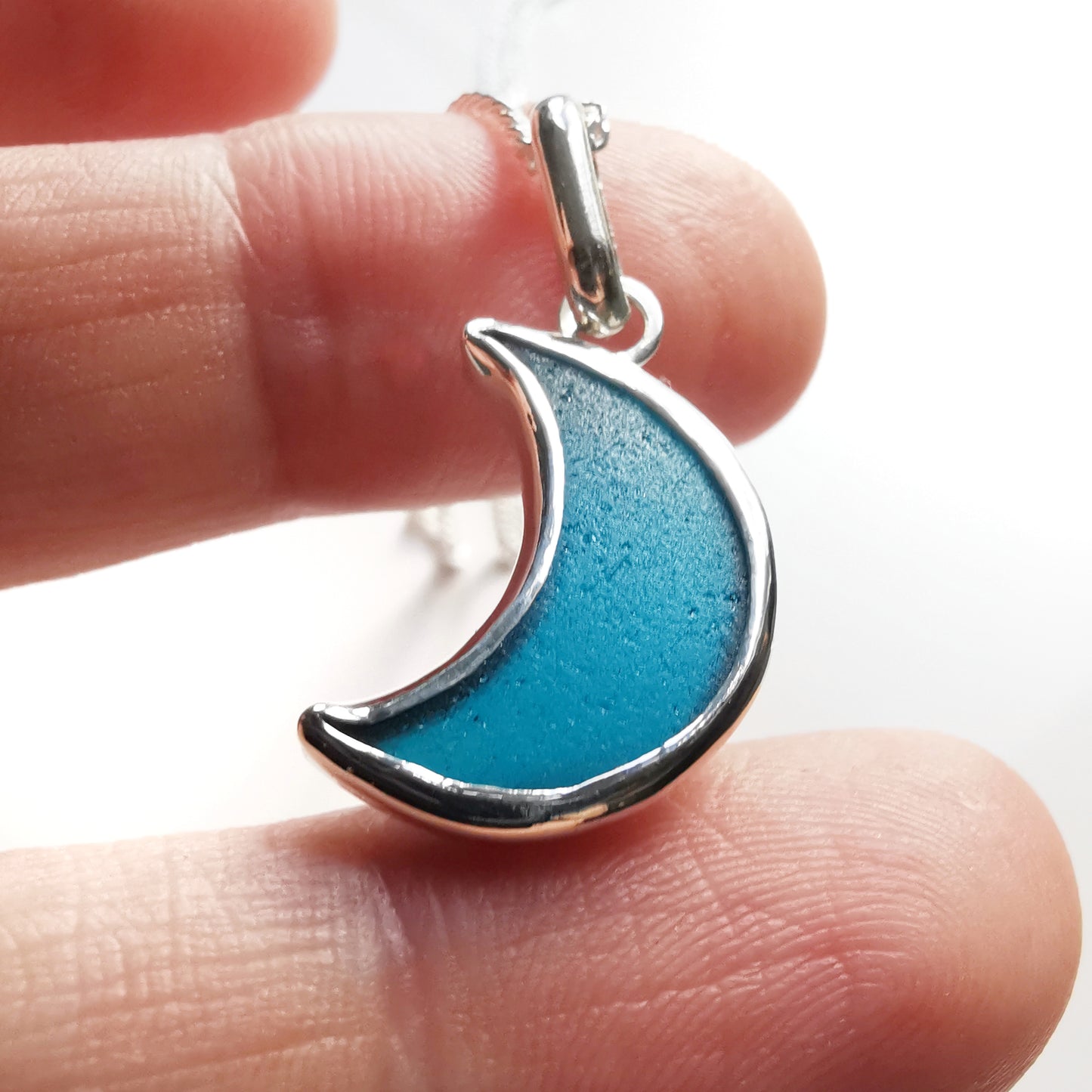 Reserved. Scottish teal blue crescent moon sea glass & sterling silver pendant.