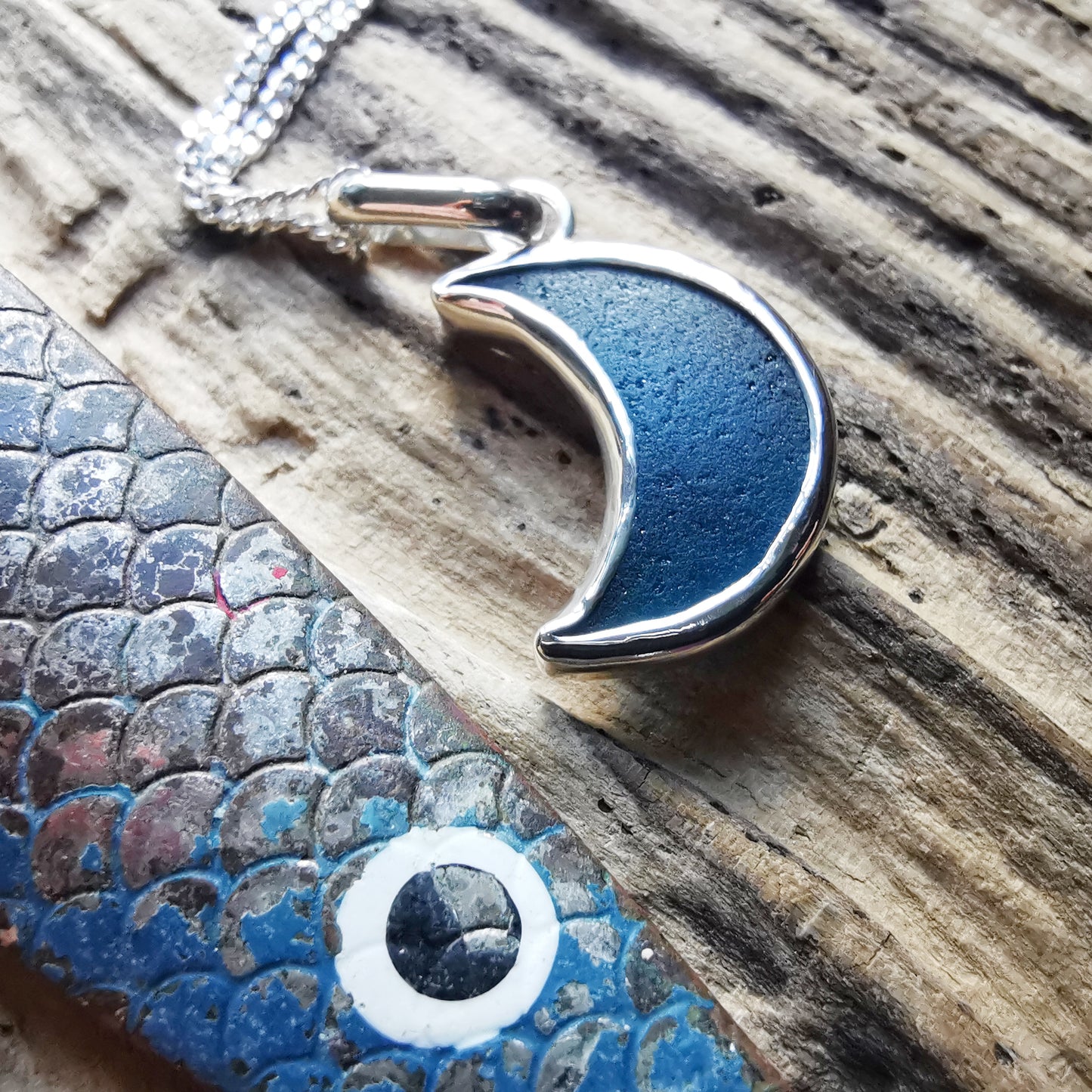 Reserved. Scottish teal blue crescent moon sea glass & sterling silver pendant.