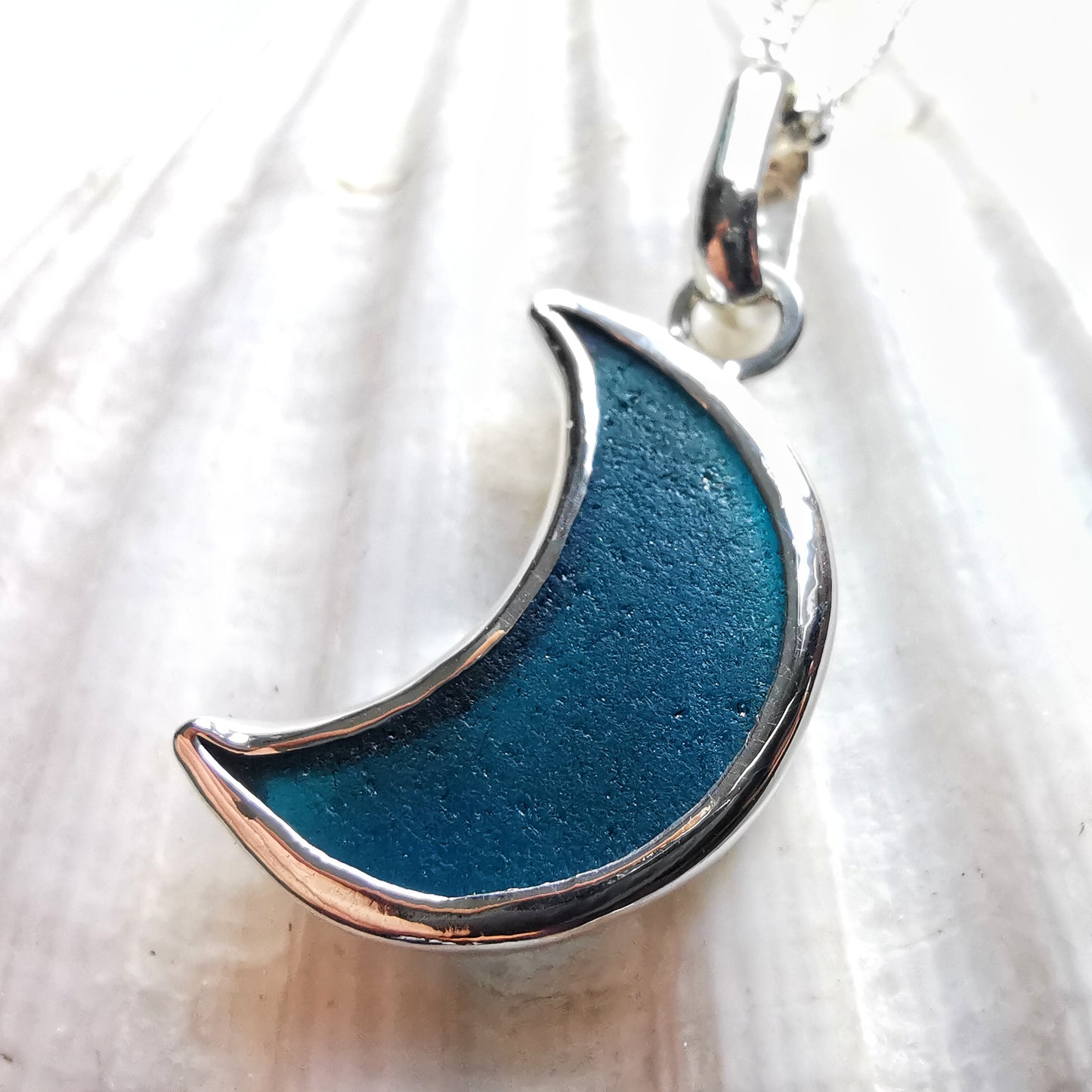 Reserved. Scottish teal blue crescent moon sea glass & sterling silver pendant.