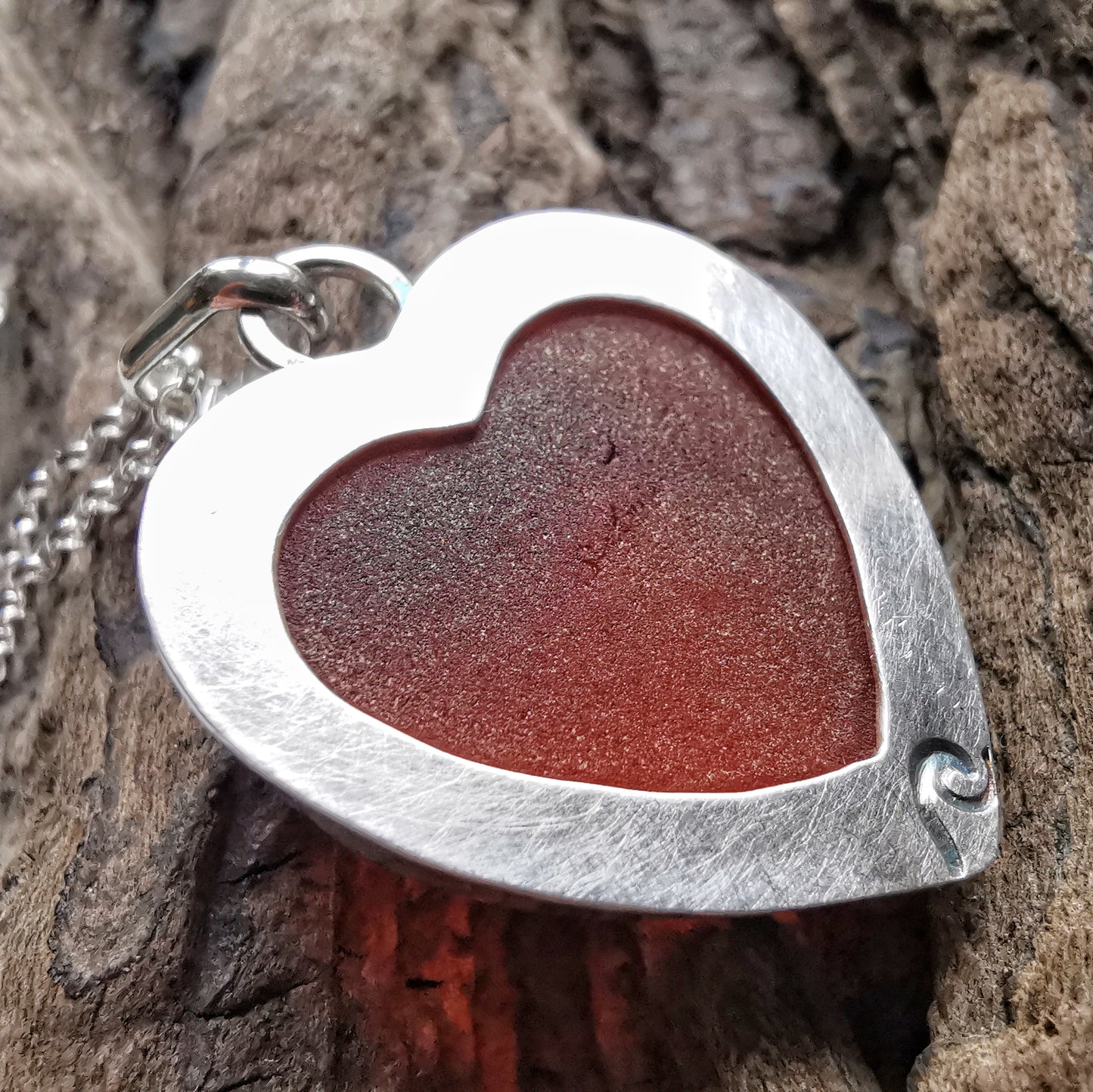 Reserved. Scottish UV deep orange sea glass heart & sterling silver pendant.