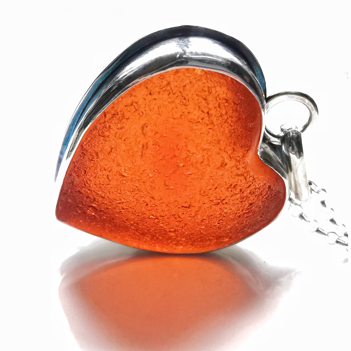 Reserved. Scottish UV deep orange sea glass heart & sterling silver pendant.