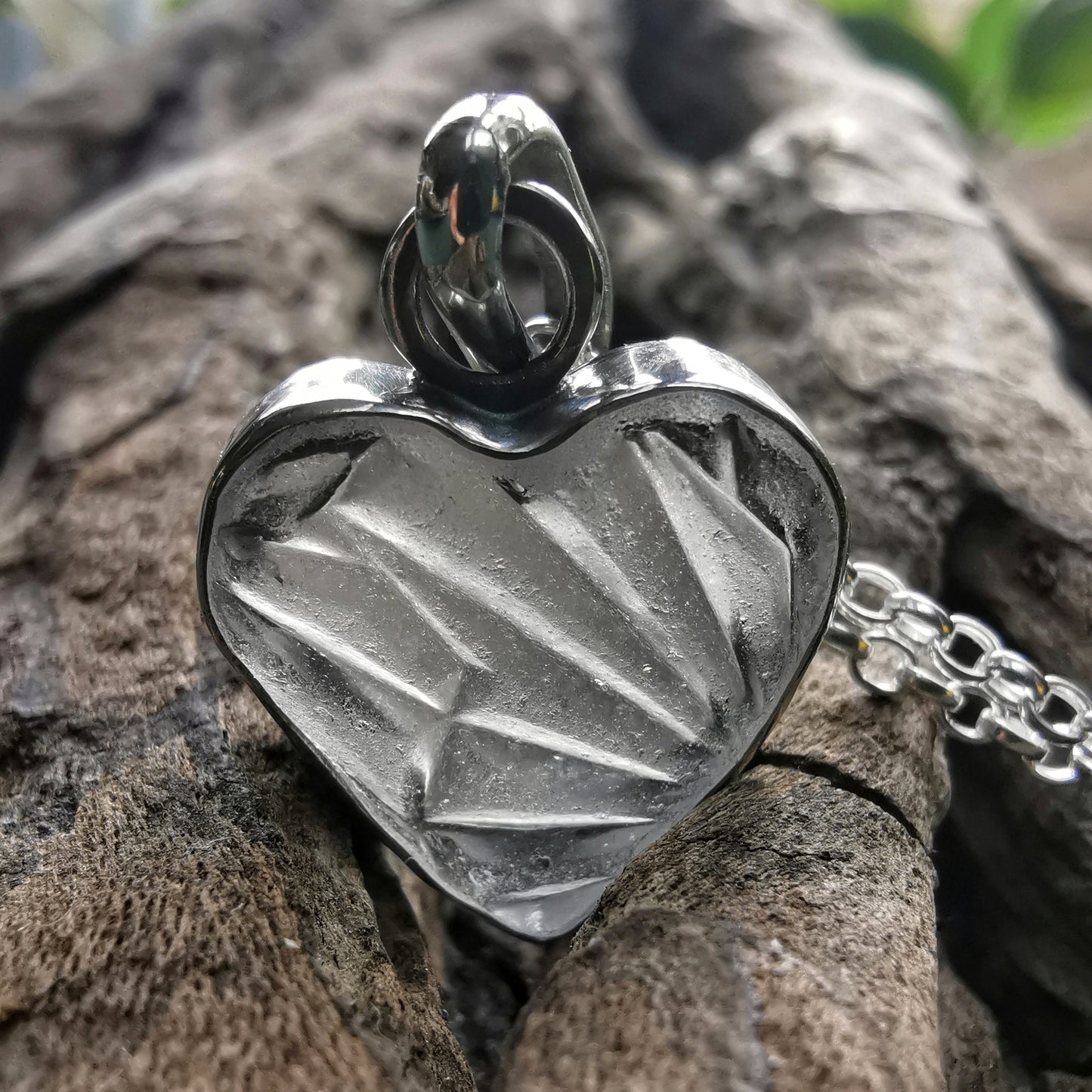 Clear sea glass heart & sterling silver pendant.