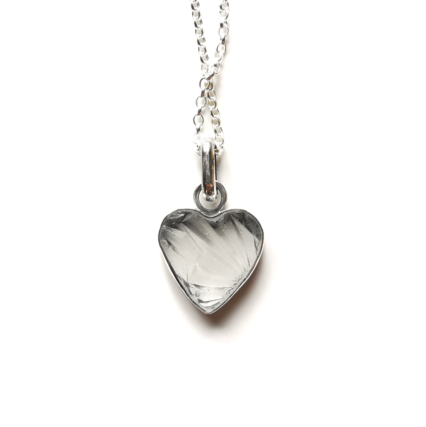 Clear sea glass heart & sterling silver pendant.