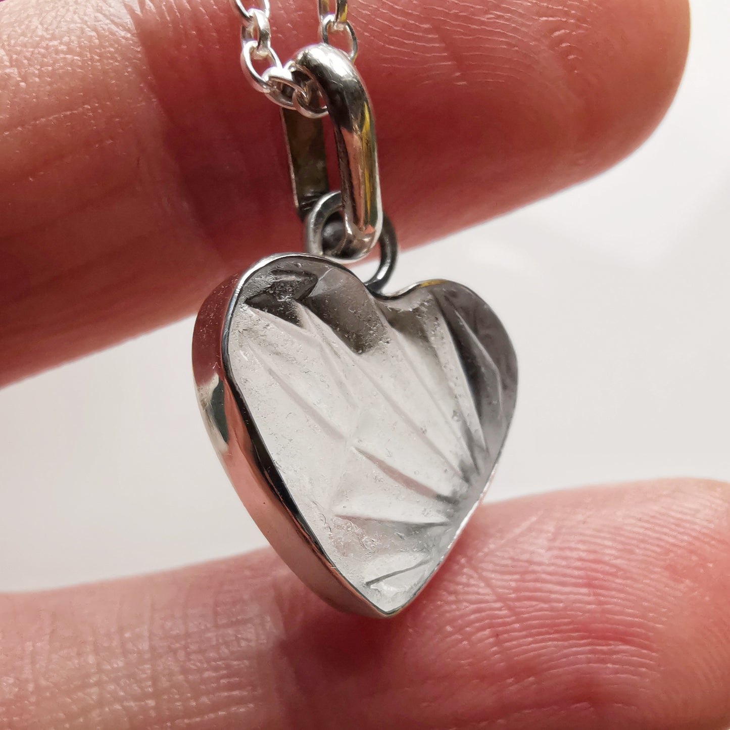 Clear sea glass heart & sterling silver pendant.
