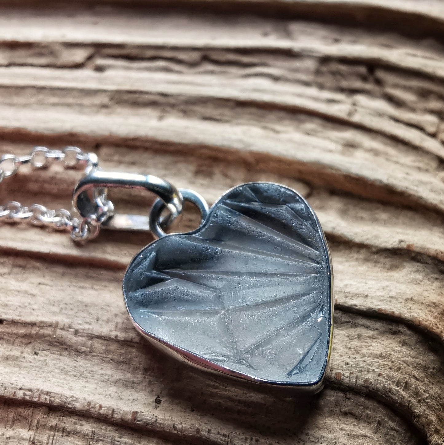 Clear sea glass heart & sterling silver pendant.