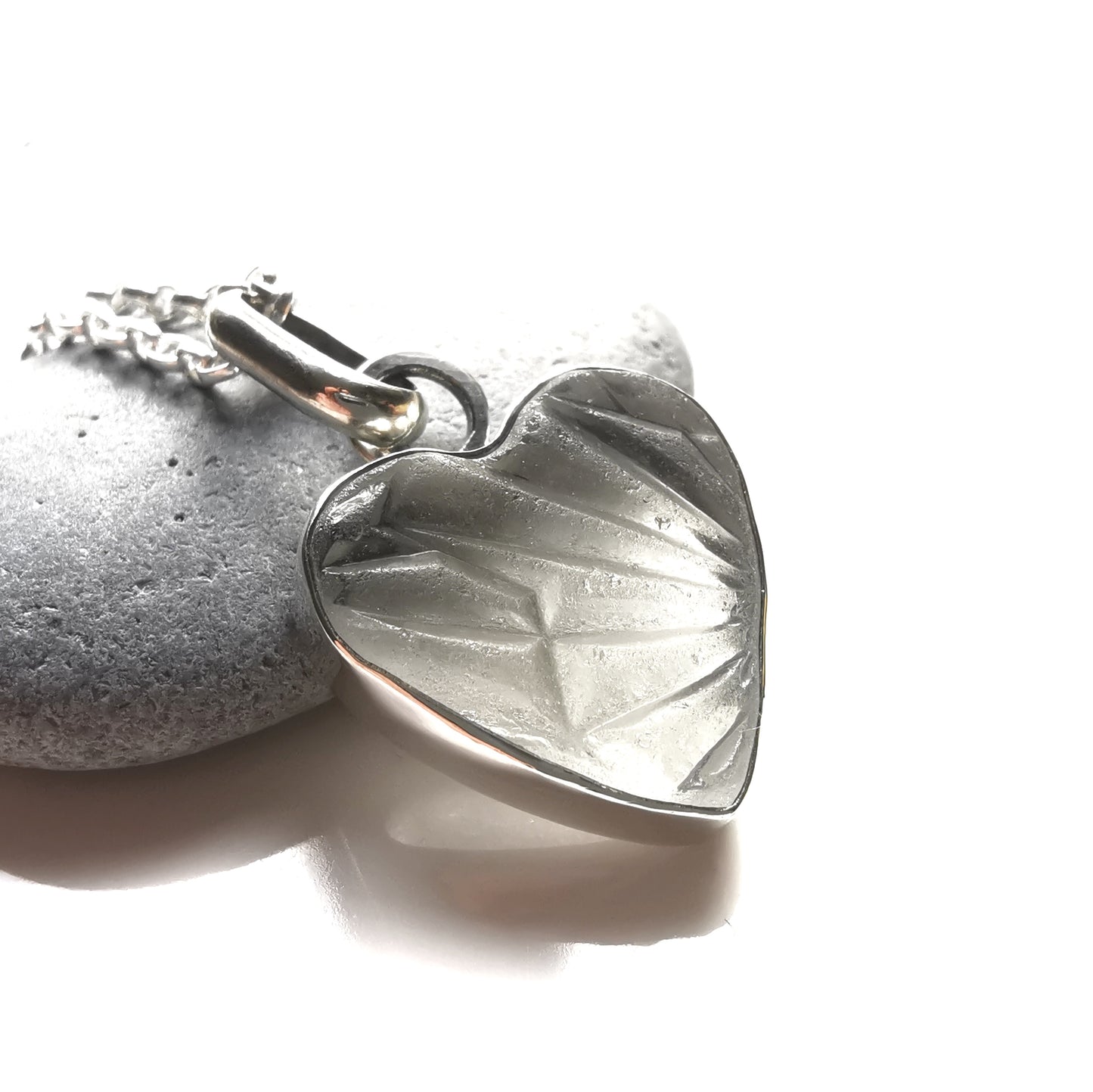 Clear sea glass heart & sterling silver pendant.
