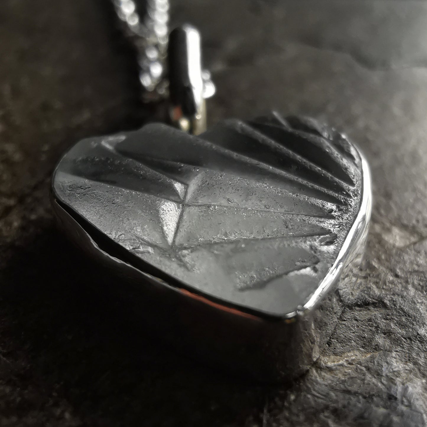 Clear sea glass heart & sterling silver pendant.