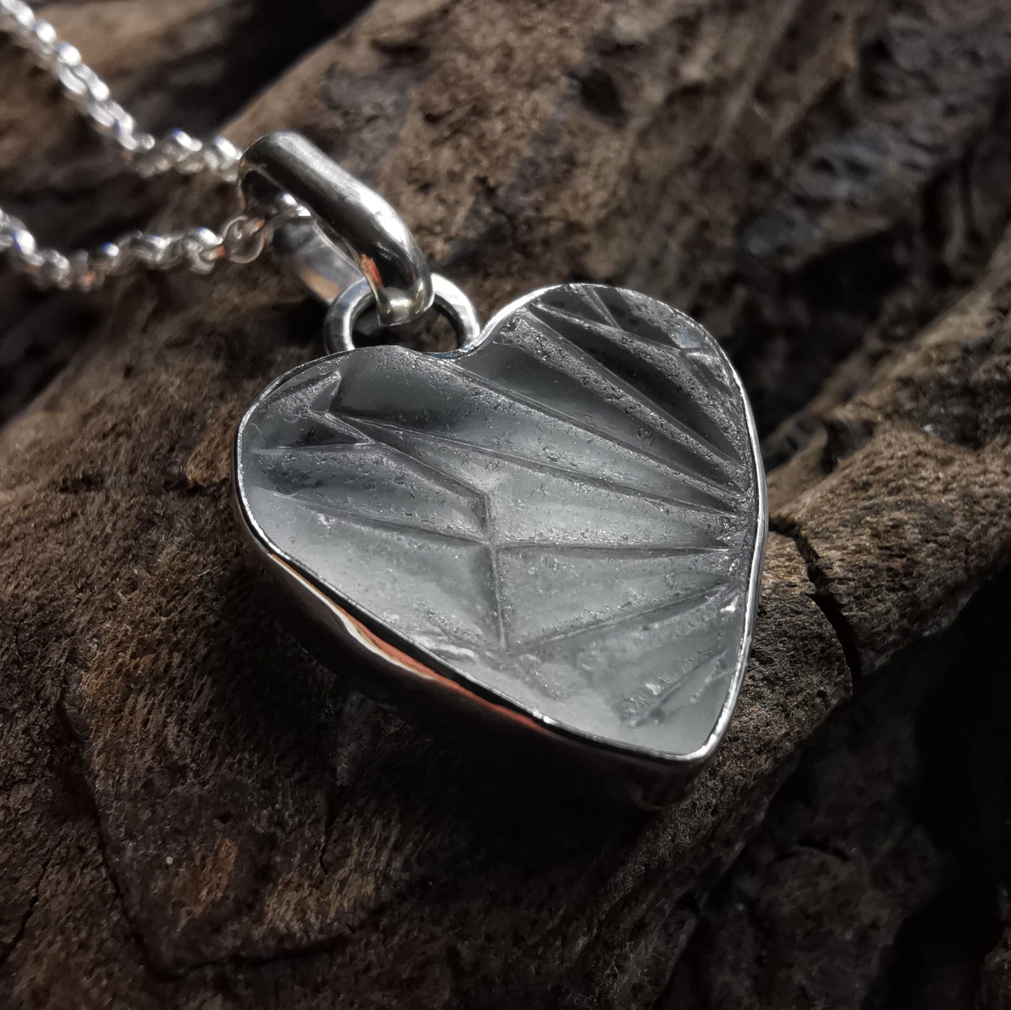 Clear sea glass heart & sterling silver pendant.