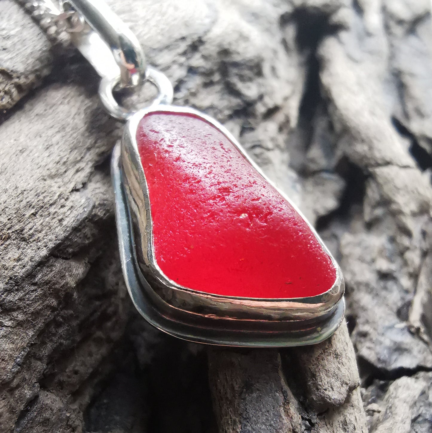 Scottish red sea glass & sterling silver pendant.